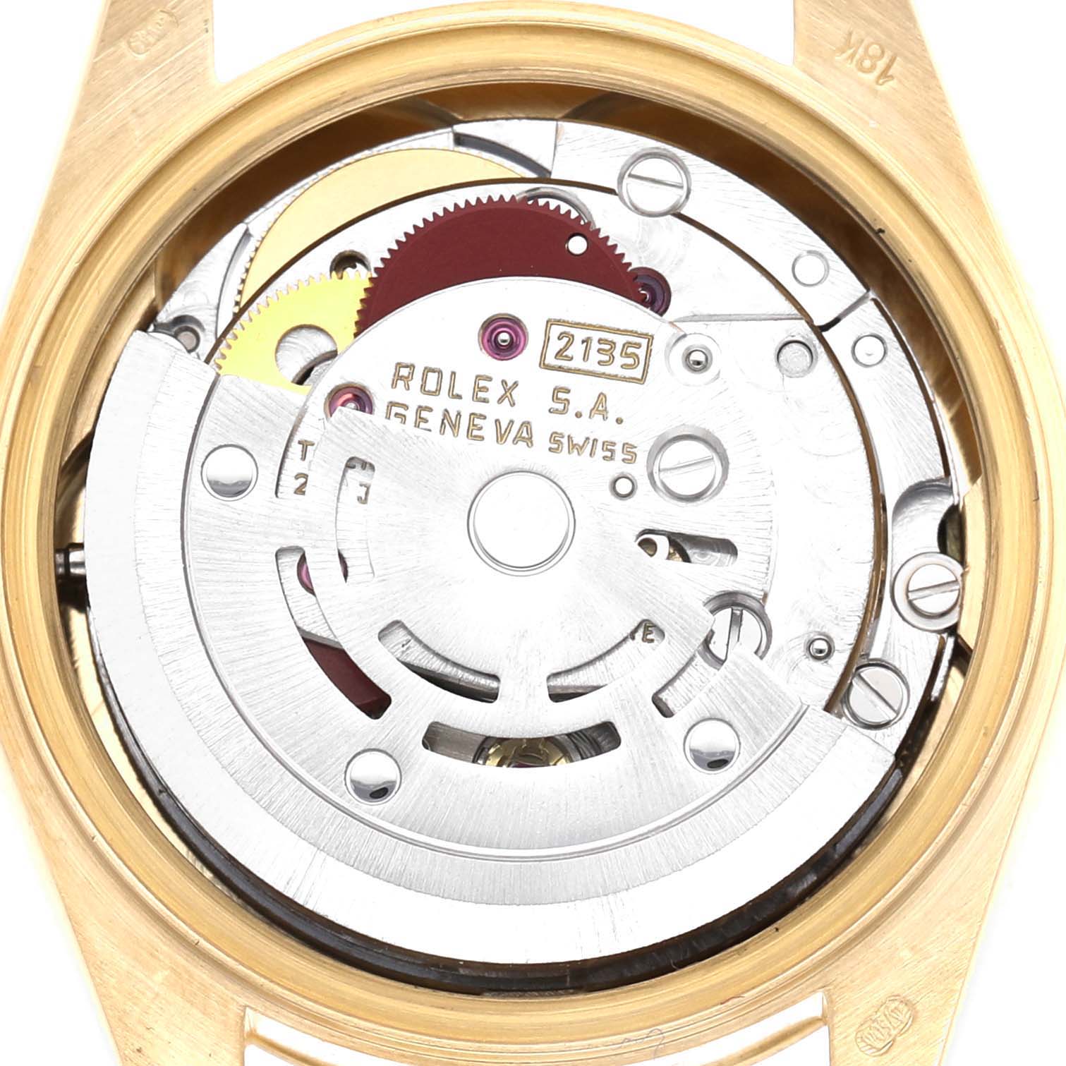 The image shows the movement of a Rolex President 69178 Women's Yellow Gold Champagne Dial model, highlighting gears and the rotor from a rear angle.