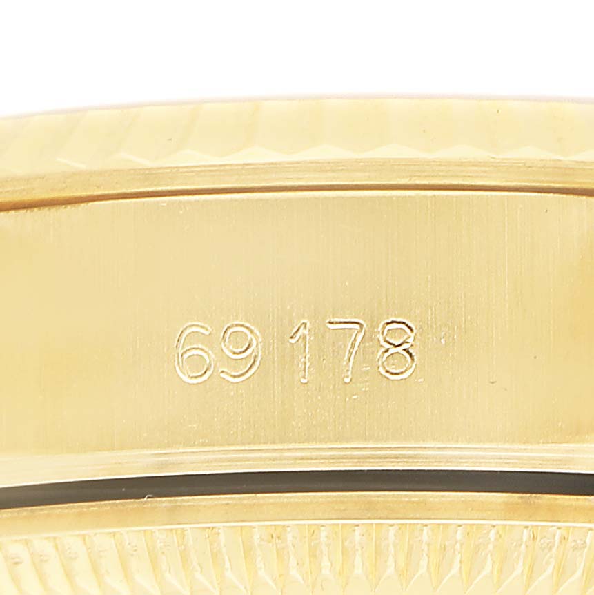 The image shows a close-up of the side of a Rolex President 69178 Women's Yellow Gold Champagne Dial model, focusing on the engraved reference number.