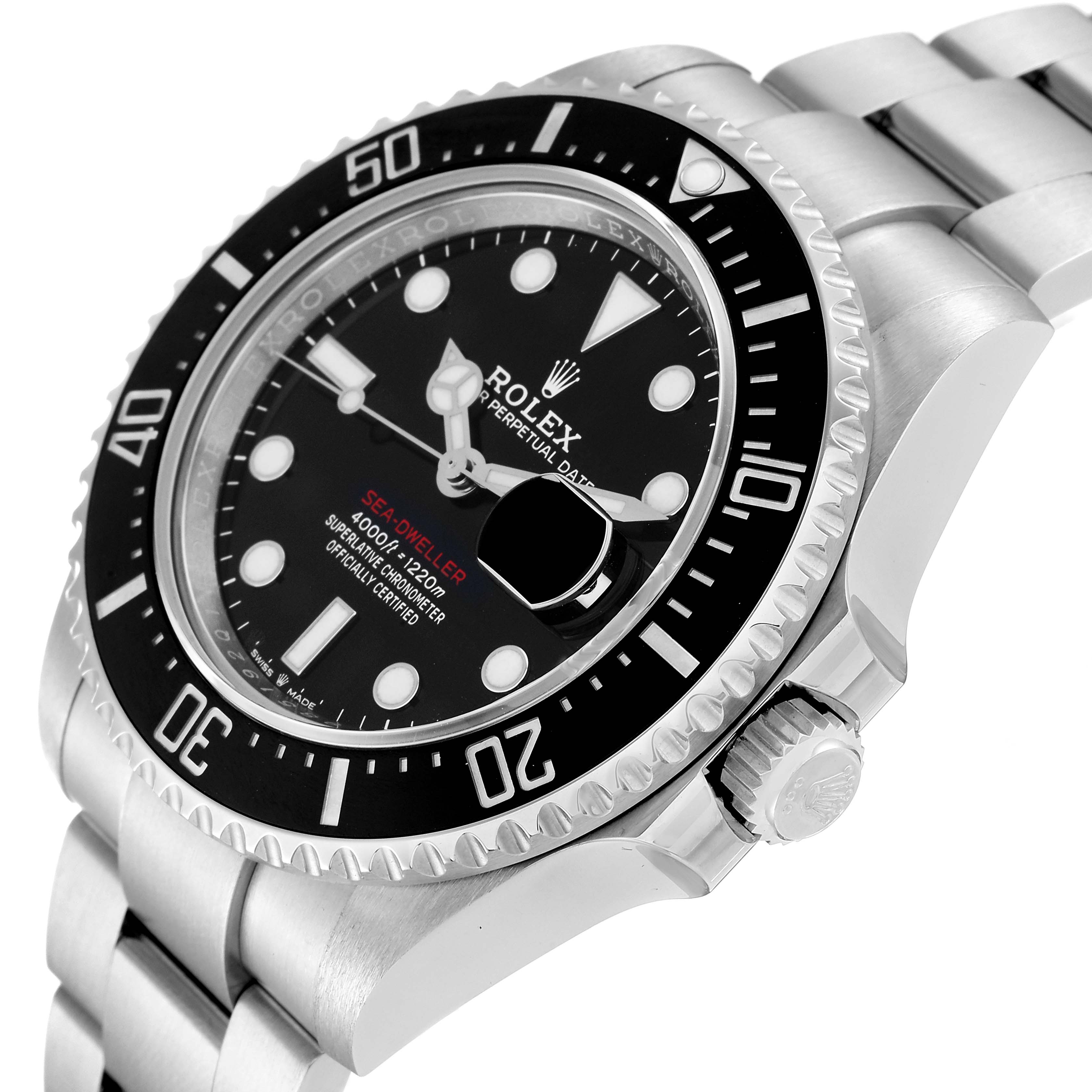 The Rolex Sea-Dweller 126600 Men
s Stainless Steel Black Dial 126600 Men
s Stainless Steel Black Dial watch is shown at an angled view, displaying the face, bezel, crown, and part of the stainless steel bracelet.