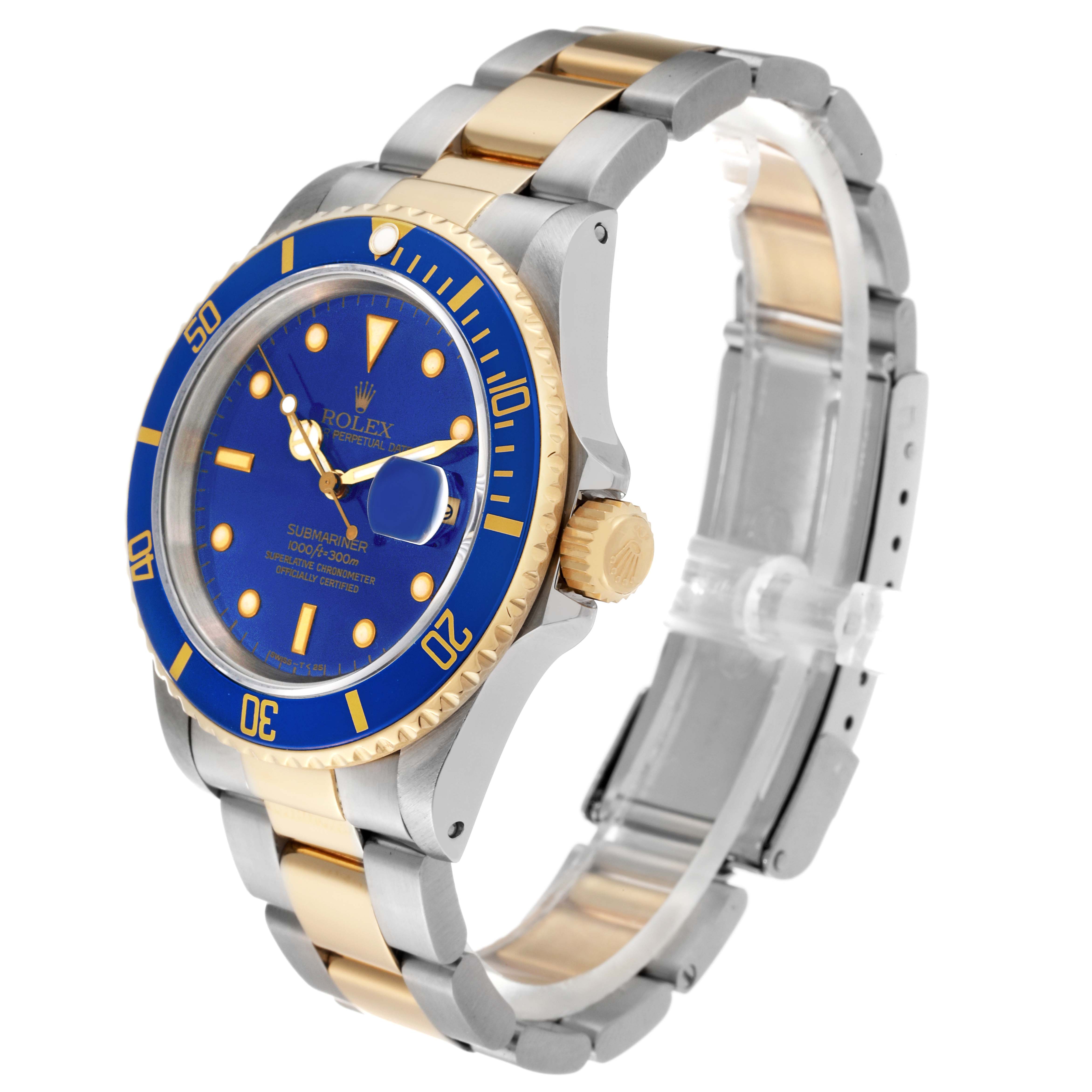The image shows a side angle of a Rolex Submariner 16613 Men's Steel and Gold (two tone) Blue Dial 16613 Men's Steel and Gold (two tone) Blue Dial watch, highlighting its blue dial, bezel, crown, and two-tone bracelet.