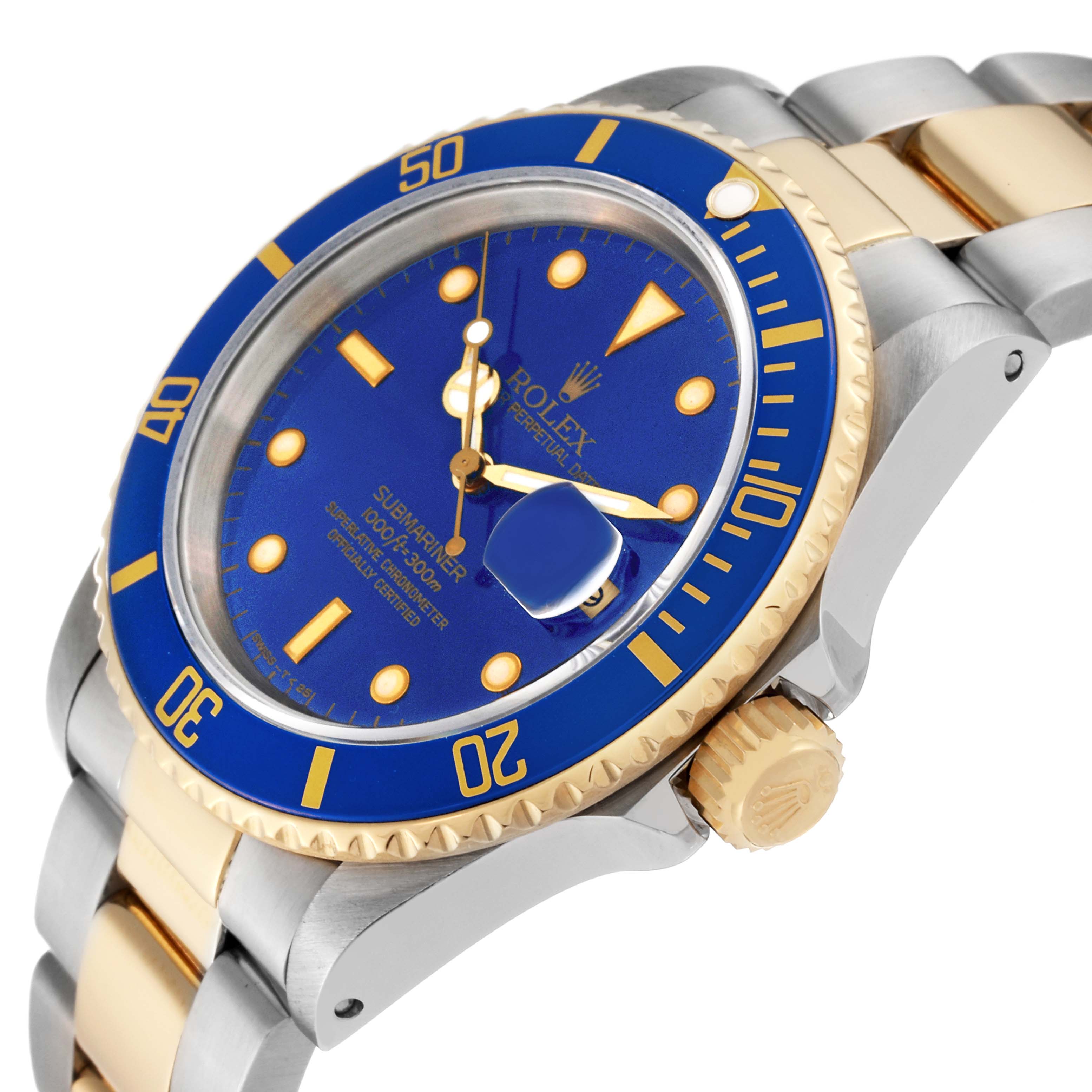 The image shows a close-up angled view of a Rolex Submariner 16613 Men's Steel and Gold (two tone) Blue Dial 16613 Men's Steel and Gold (two tone) Blue Dial watch, highlighting the blue dial, bezel, and the two-tone bracelet.