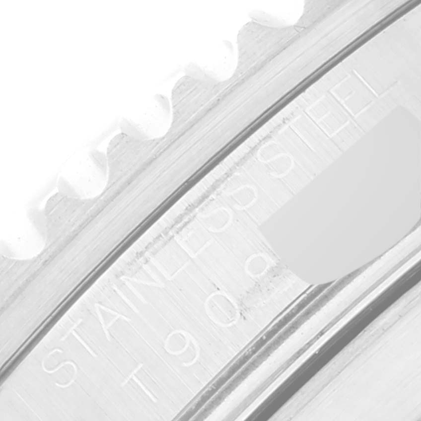 The image shows a close-up of the bezel and the engraved text on a Rolex Submariner 16610 Men
s Stainless Steel Black Dial 16610 Men
s Stainless Steel Black Dial watch.