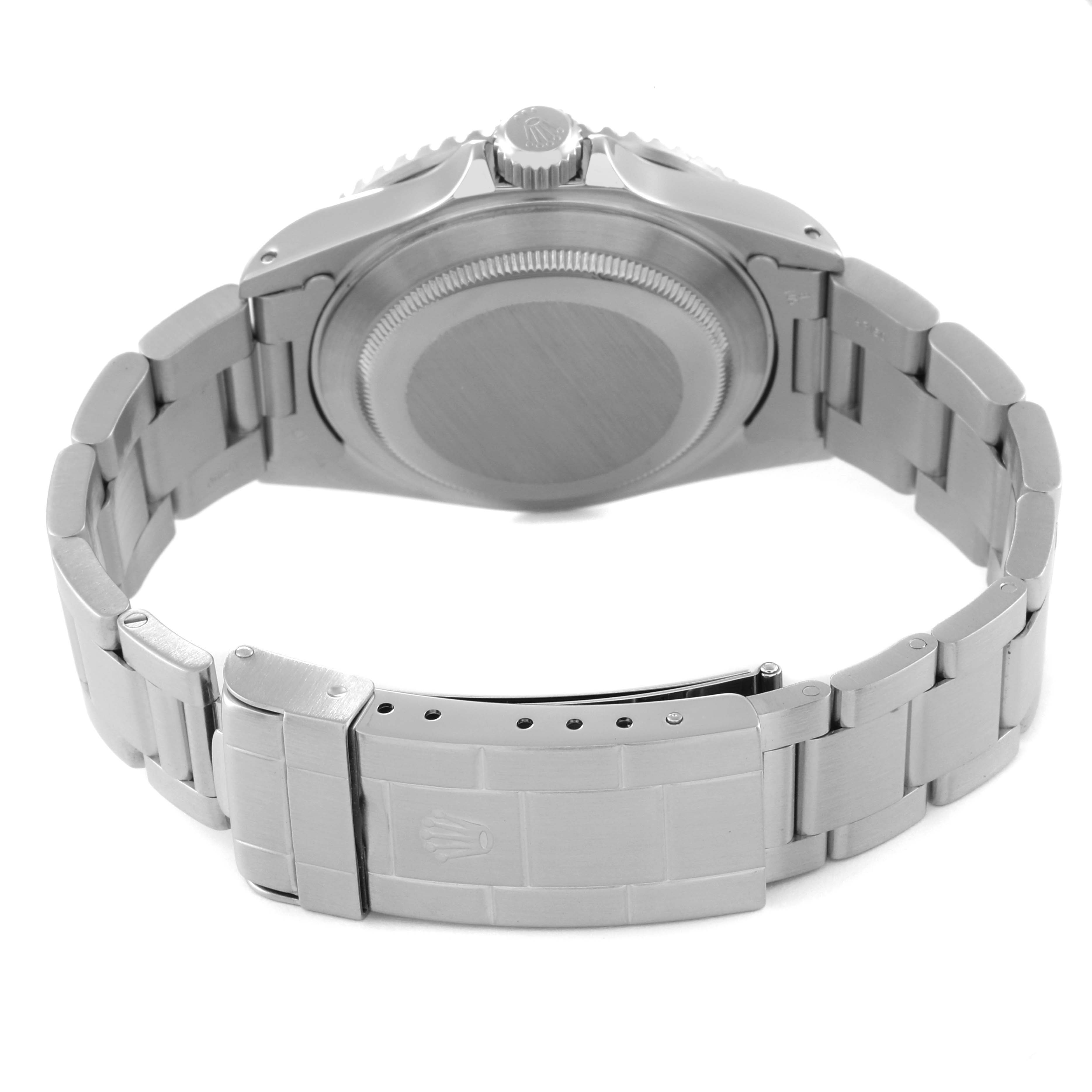 The image shows the back view of the Rolex Submariner 16610 Men
s Stainless Steel Black Dial 16610 Men
s Stainless Steel Black Dial watch, focusing on the watch case back and metal bracelet.