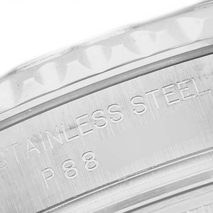 The image shows a close-up of the edge and engraved stainless steel markings on a Rolex Yacht-Master 169622 Women's Stainless Steel Silver Dial watch case.