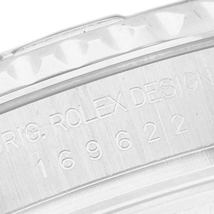 The image shows a close-up of the Rolex Yacht-Master 169622 Women's Stainless Steel Silver Dial's engraved case side, highlighting a portion of the serial number.