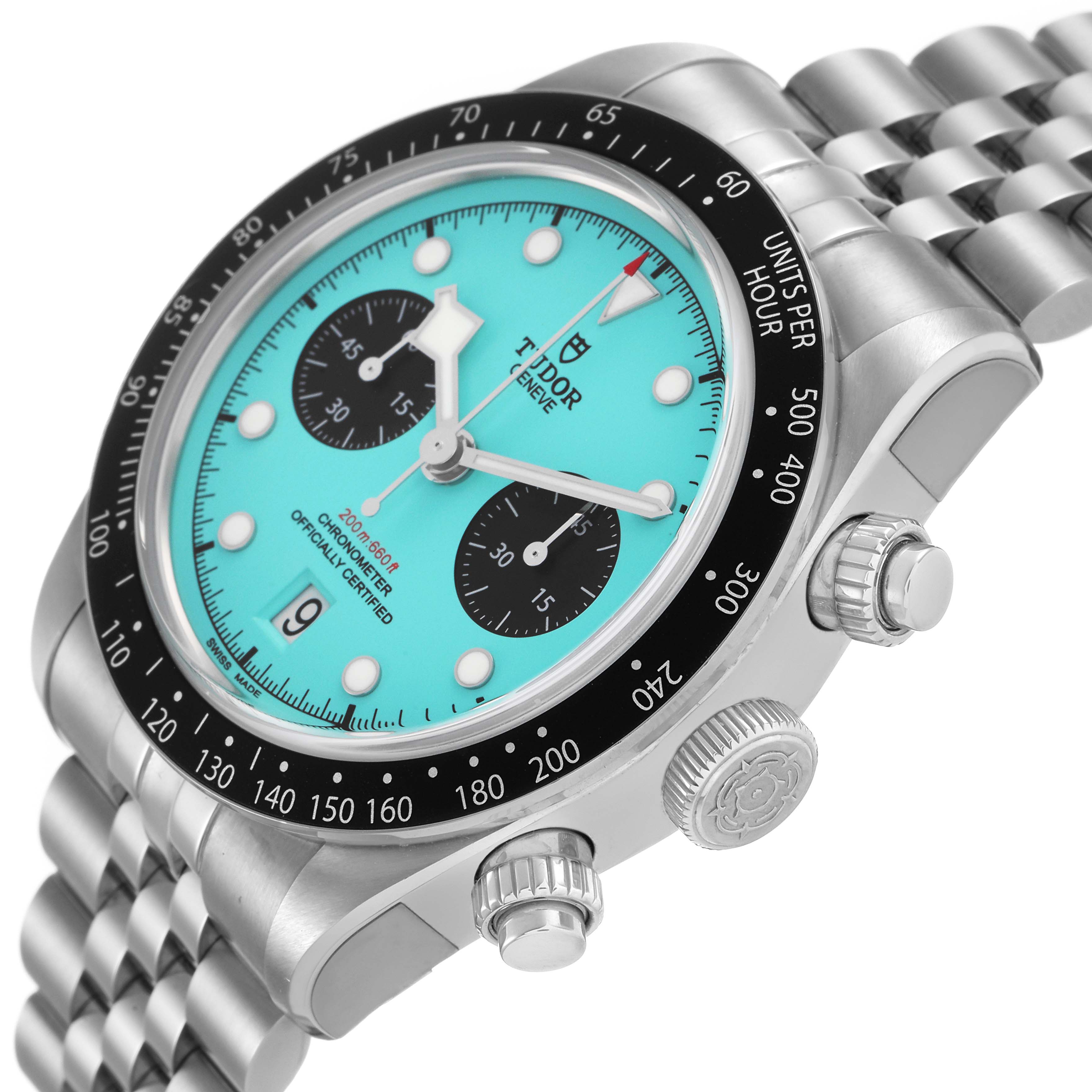 The Tudor Heritage Chrono 79360N Men's Stainless Steel Blue Dial watch is shown at a slight angle, highlighting the turquoise dial, black subdials, bezel, and bracelet.