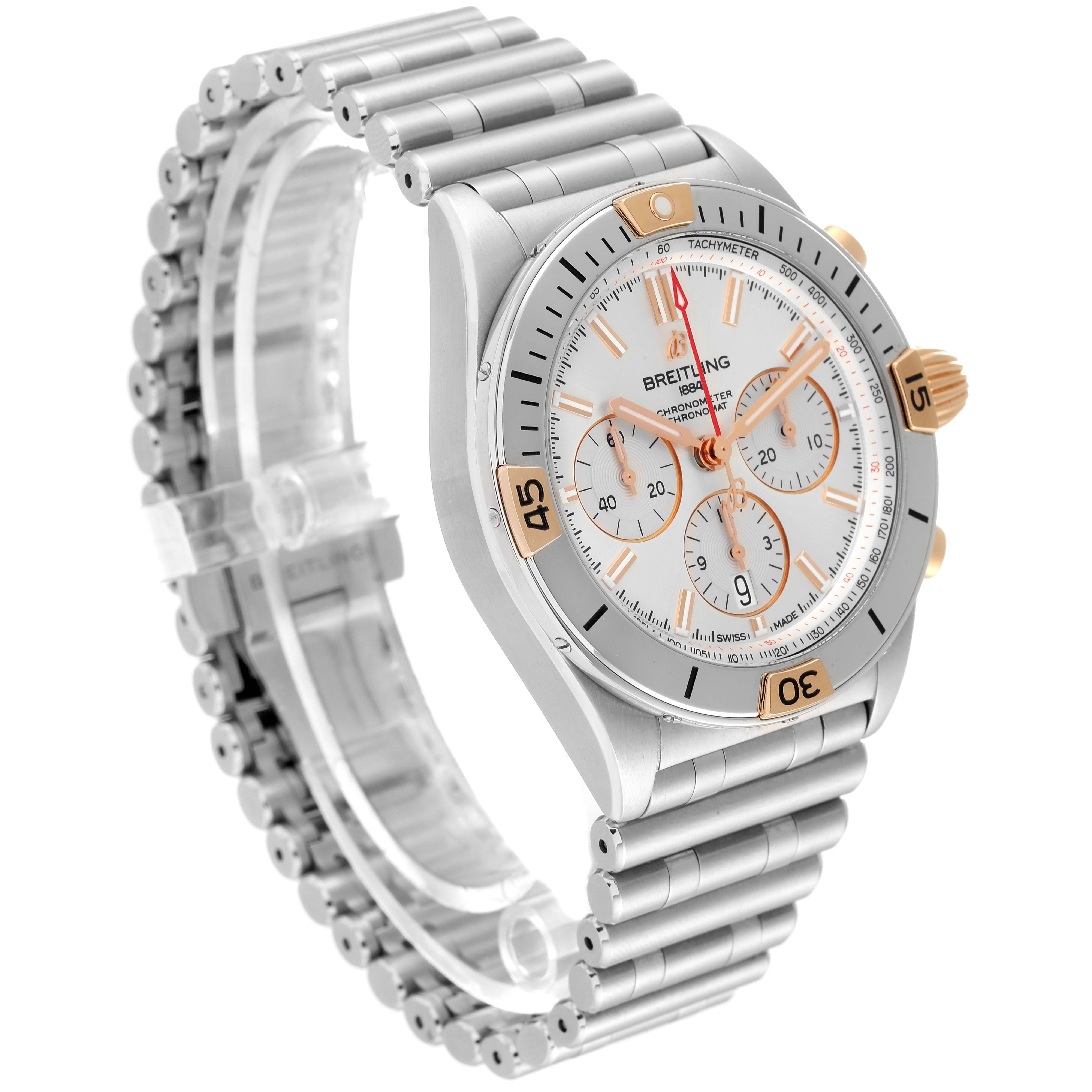 The image shows a three-quarter view of a Breitling Chronomat IB0134 Men
s Stainless Steel Silver Dial IB0134 Men
s Stainless Steel Silver Dial watch, highlighting its face, bezel, and bracelet.