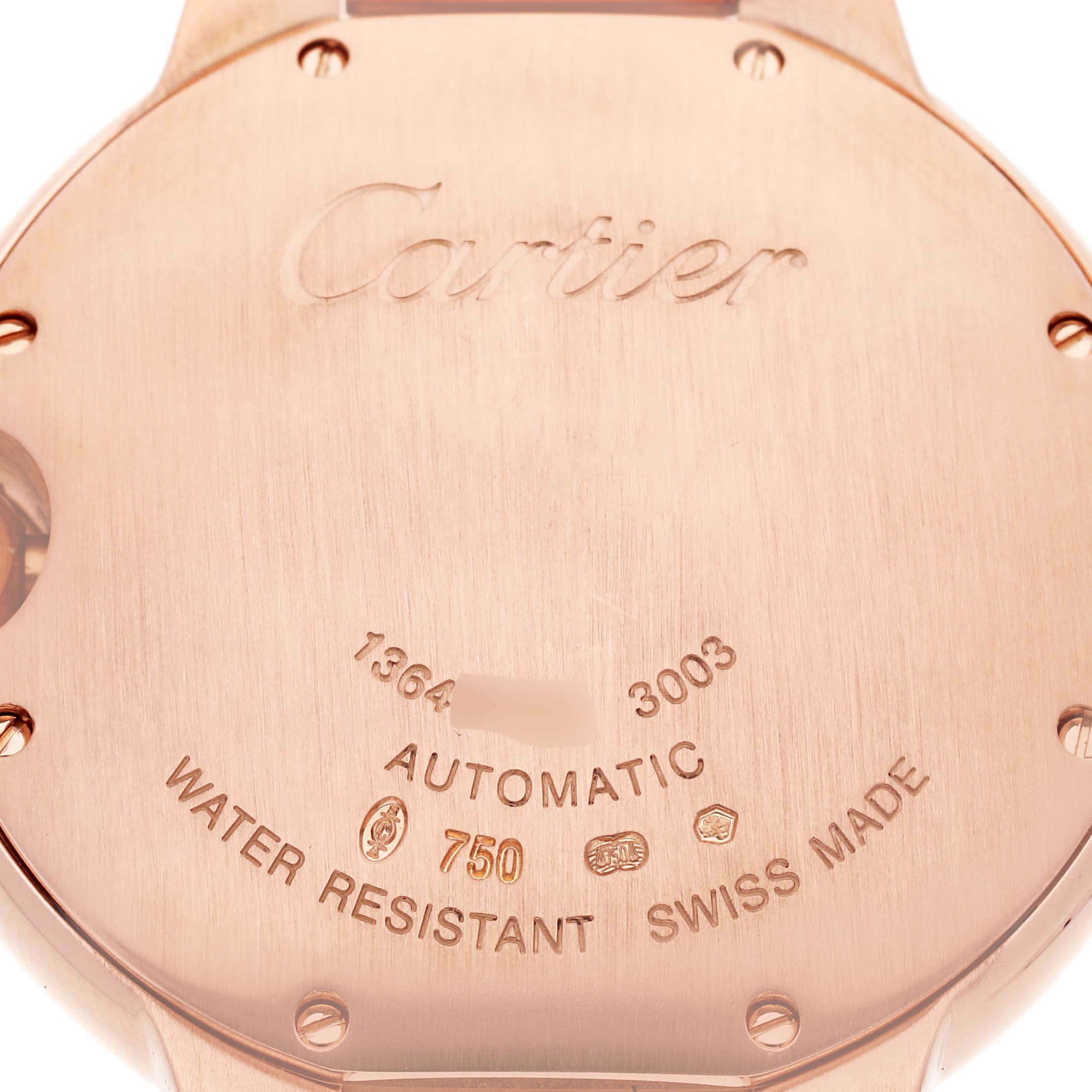 The image shows the back of the Cartier Ballon Bleu men's watch, model number W69004Z2, featuring engravings about its automatic movement and water resistance.