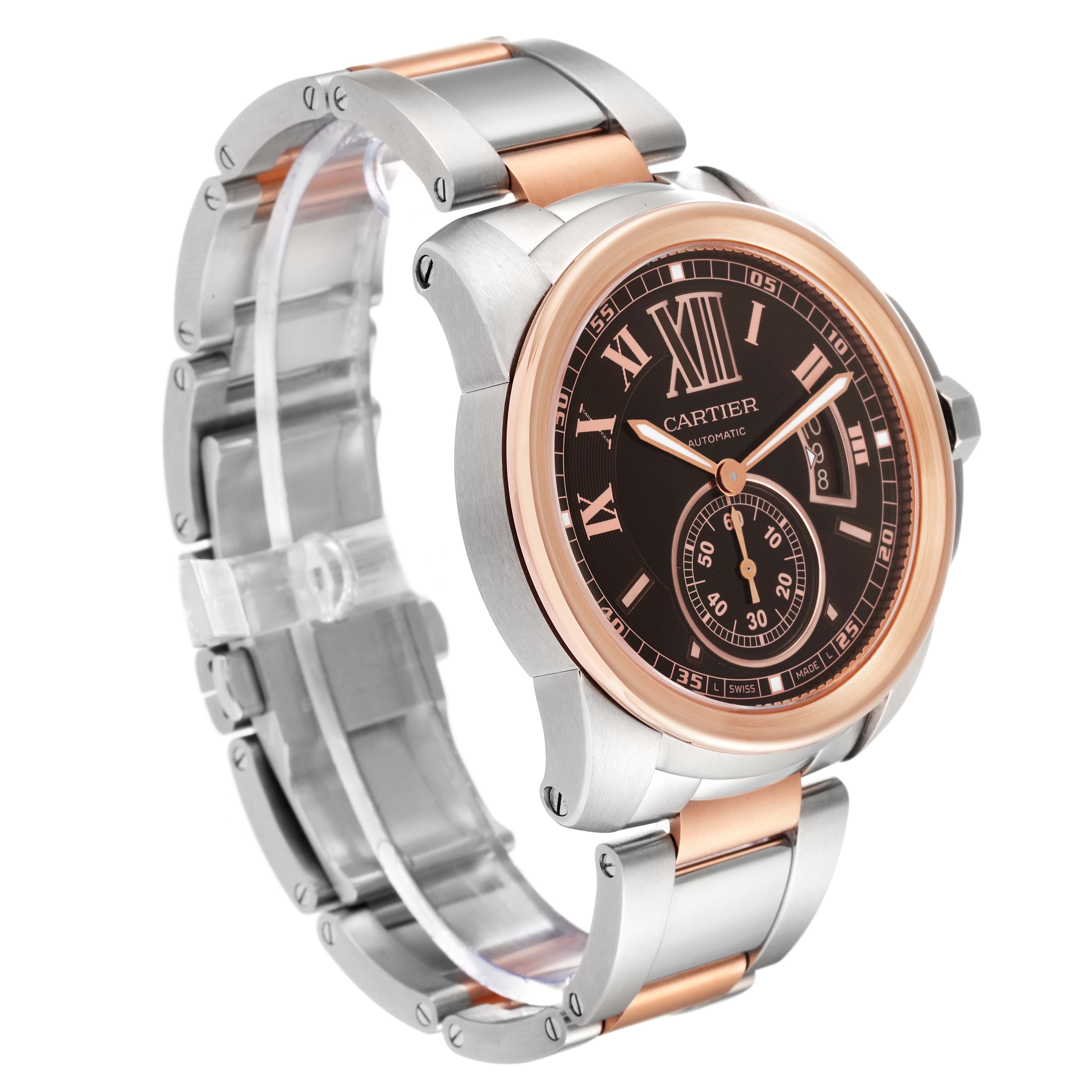 The image shows a Calibre de Cartier watch by Cartier from a three-quarter side angle, displaying its dial and bracelet.