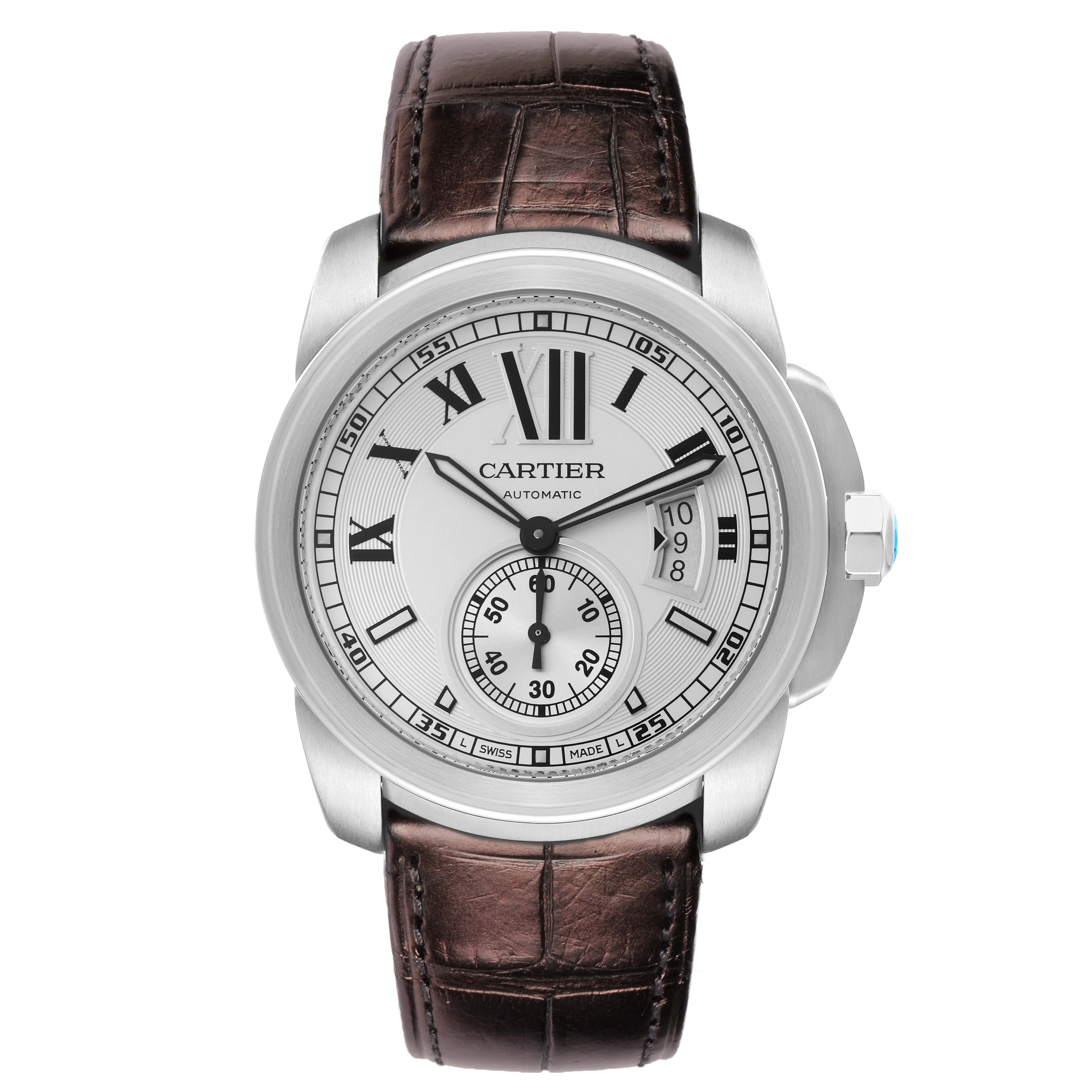 The image shows a Calibre de Cartier model W7100037 watch from the front, highlighting the dial, hands, and brown leather strap.
