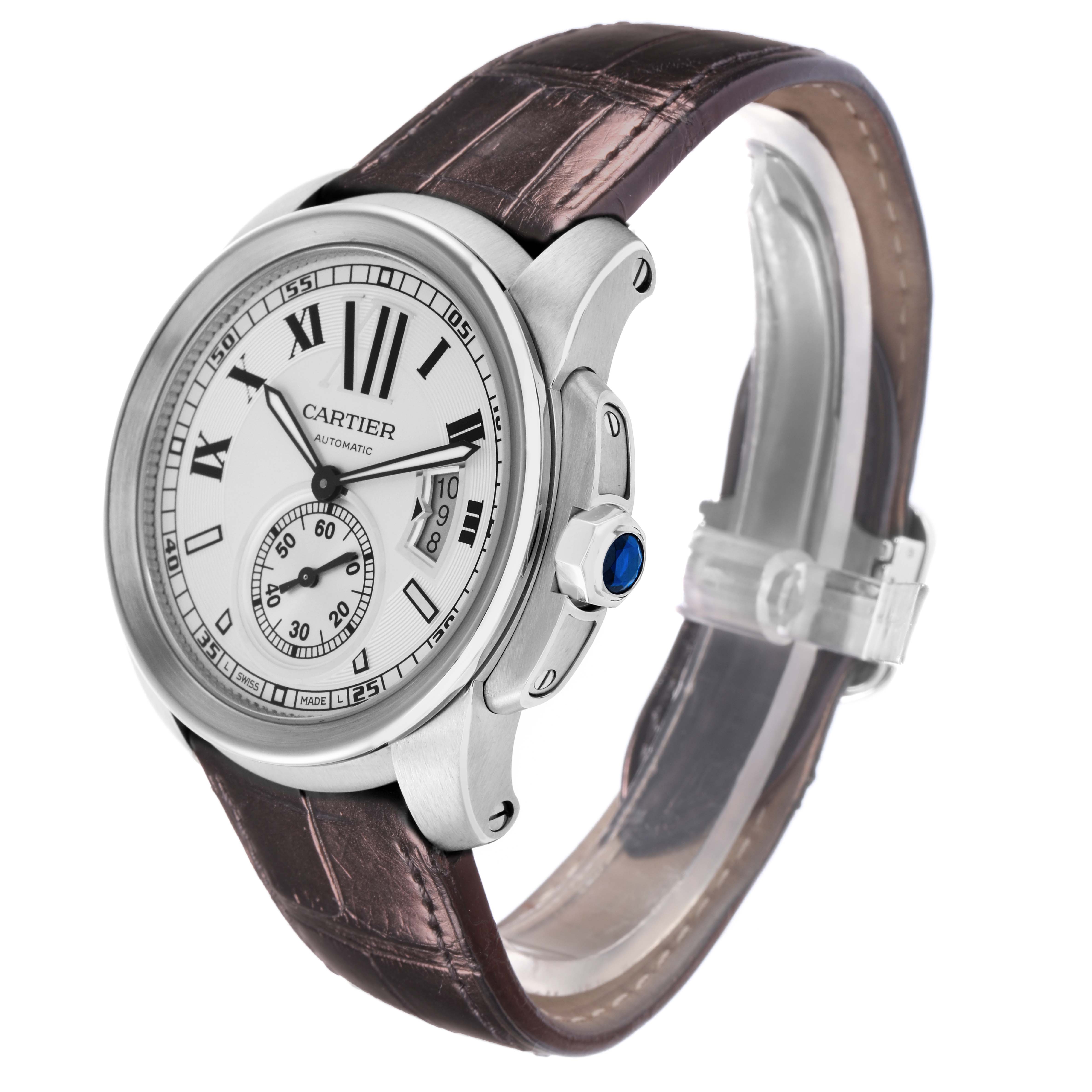 The image shows a Calibre de Cartier Mens watch, model W7100037, at a three-quarter angle, highlighting its dial, crown, and part of the leather strap.
