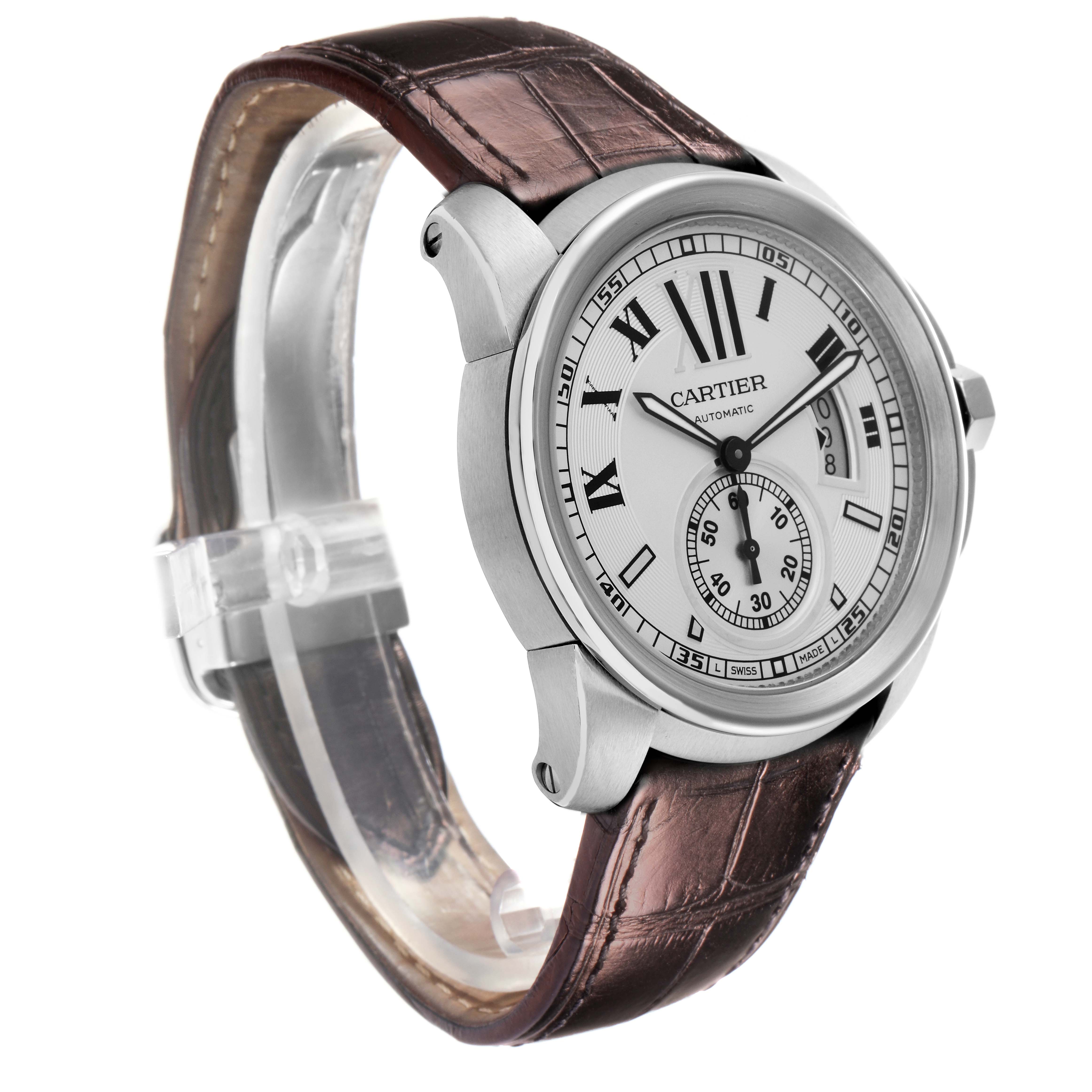 The image shows a Calibre de Cartier watch, model number W7100037, at a three-quarter angle highlighting the face, bezel, and brown leather strap.