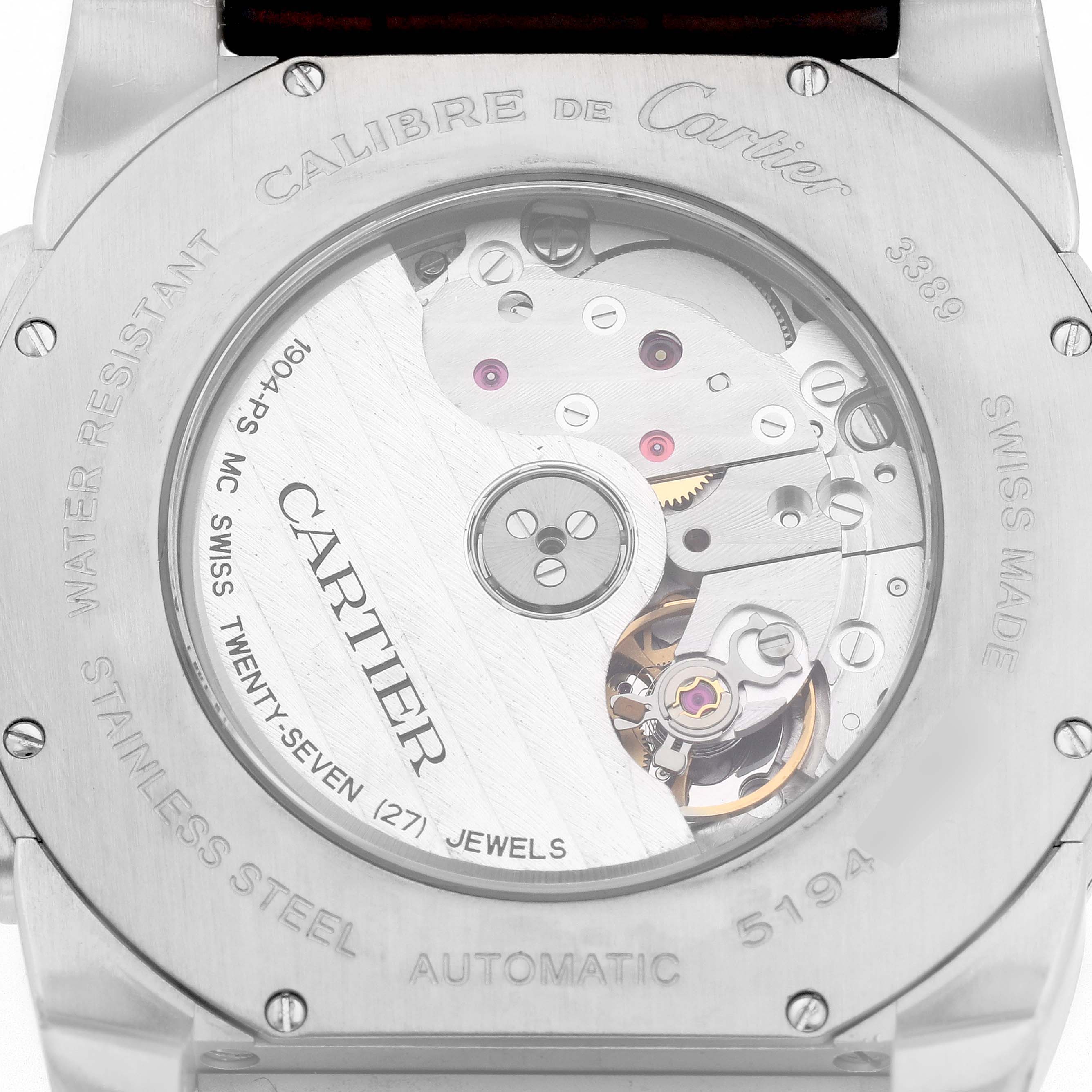 The image shows the back of the Calibre de Cartier watch, model number W7100037, highlighting the movement and engravings on the case.