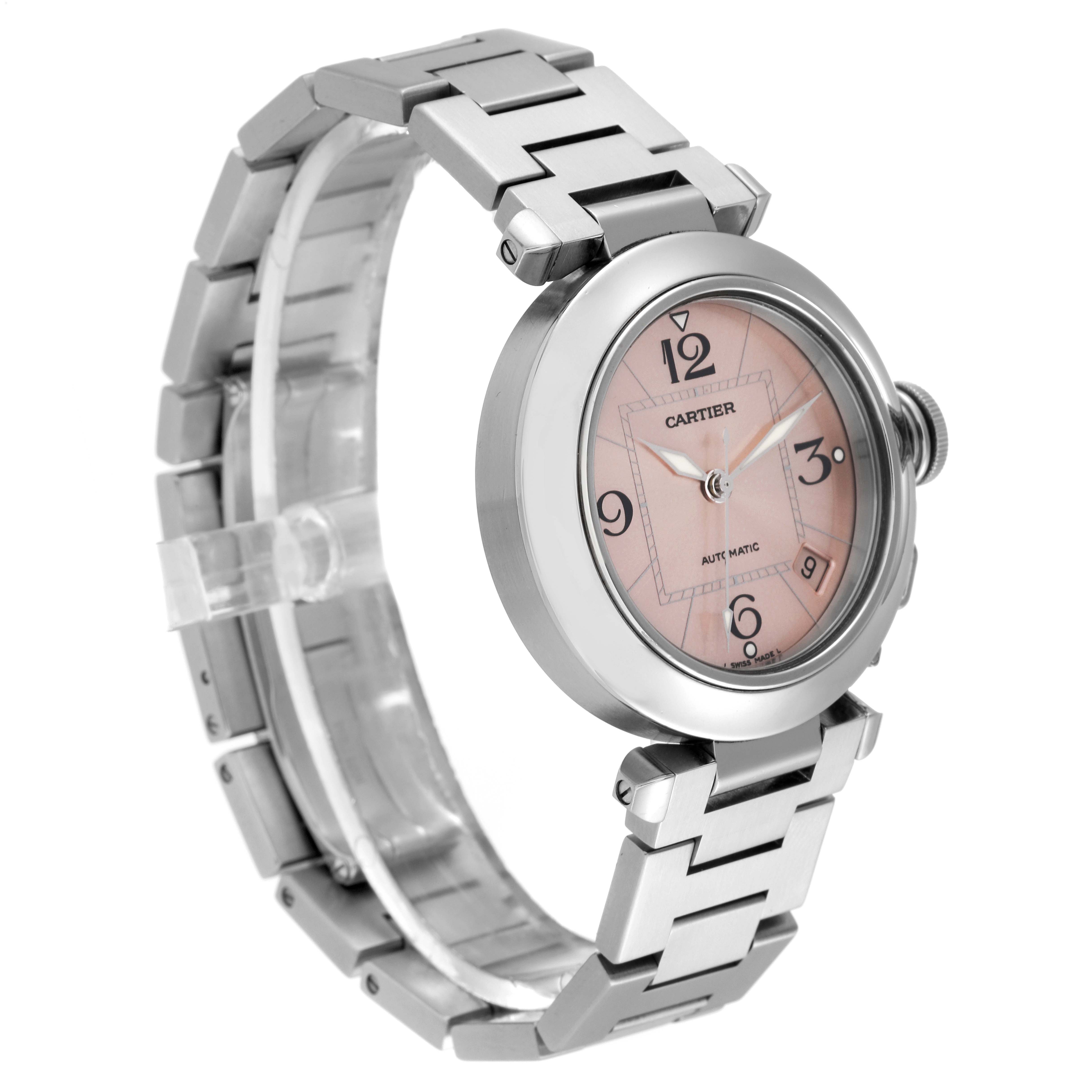 This image shows a Cartier Pasha W31075M7 Women's Stainless Steel Pink Dial W31075M7 Women's Stainless Steel Pink Dial model watch from a front-side angle, highlighting its round face and metal bracelet.