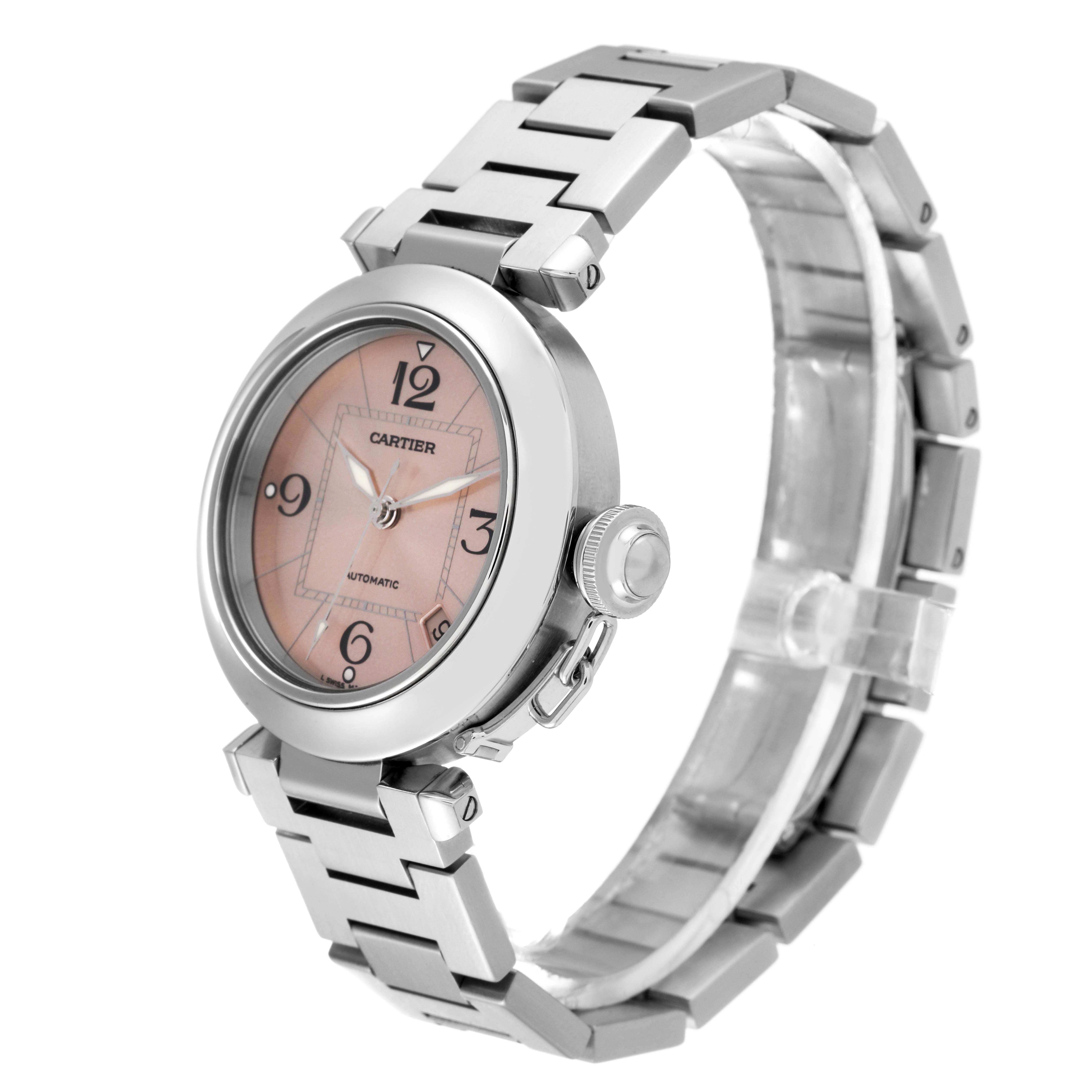 This Cartier Pasha W31075M7 Women's Stainless Steel Pink Dial W31075M7 Women's Stainless Steel Pink Dial watch is shown from a three-quarter angle, displaying the face, crown, and bracelet.