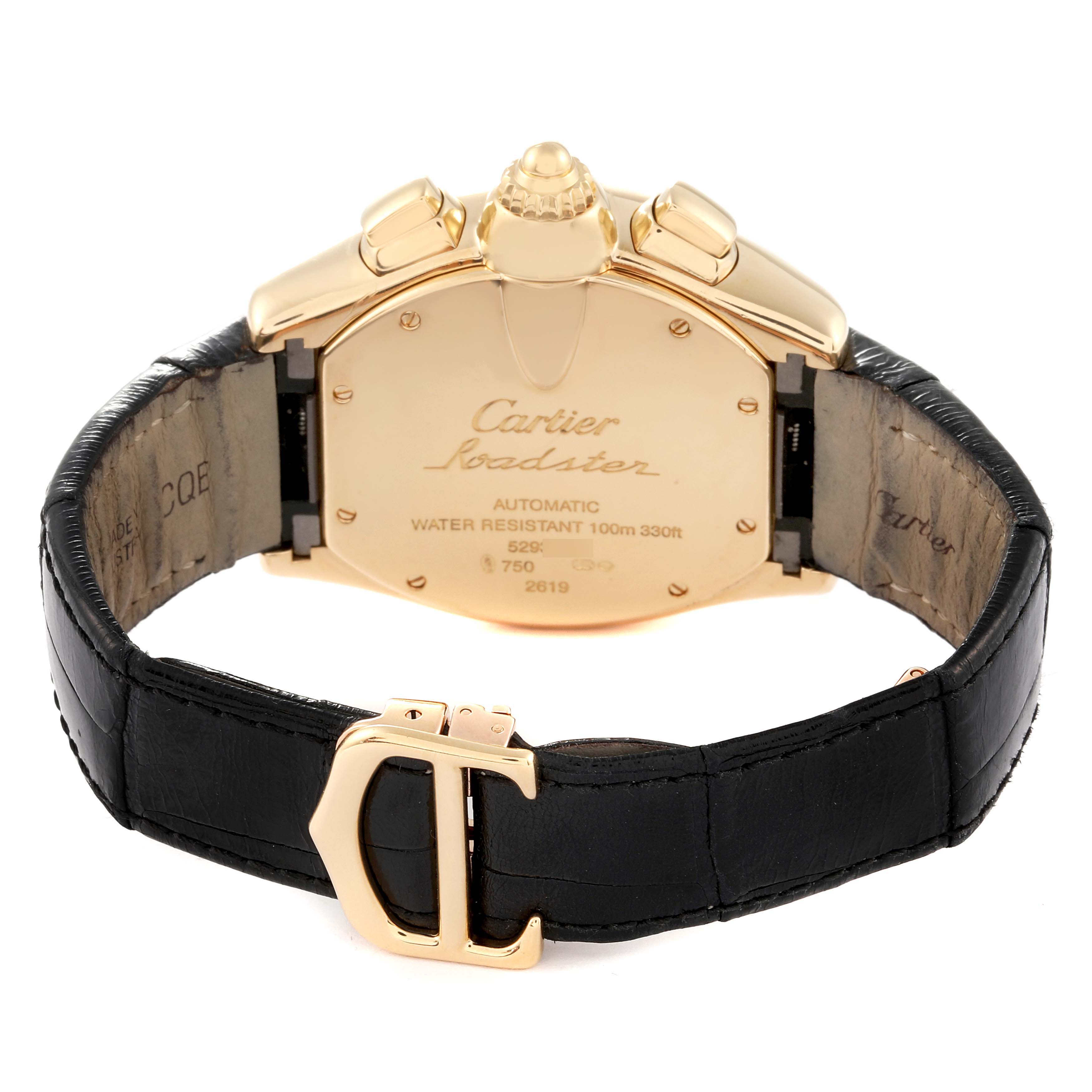 The image shows the back case and strap of a Cartier Roadster W62021Y3 Men's Yellow Gold Champagne Dial W62021Y3 Men's Yellow Gold Champagne Dial watch, featuring a gold accent and black leather strap.