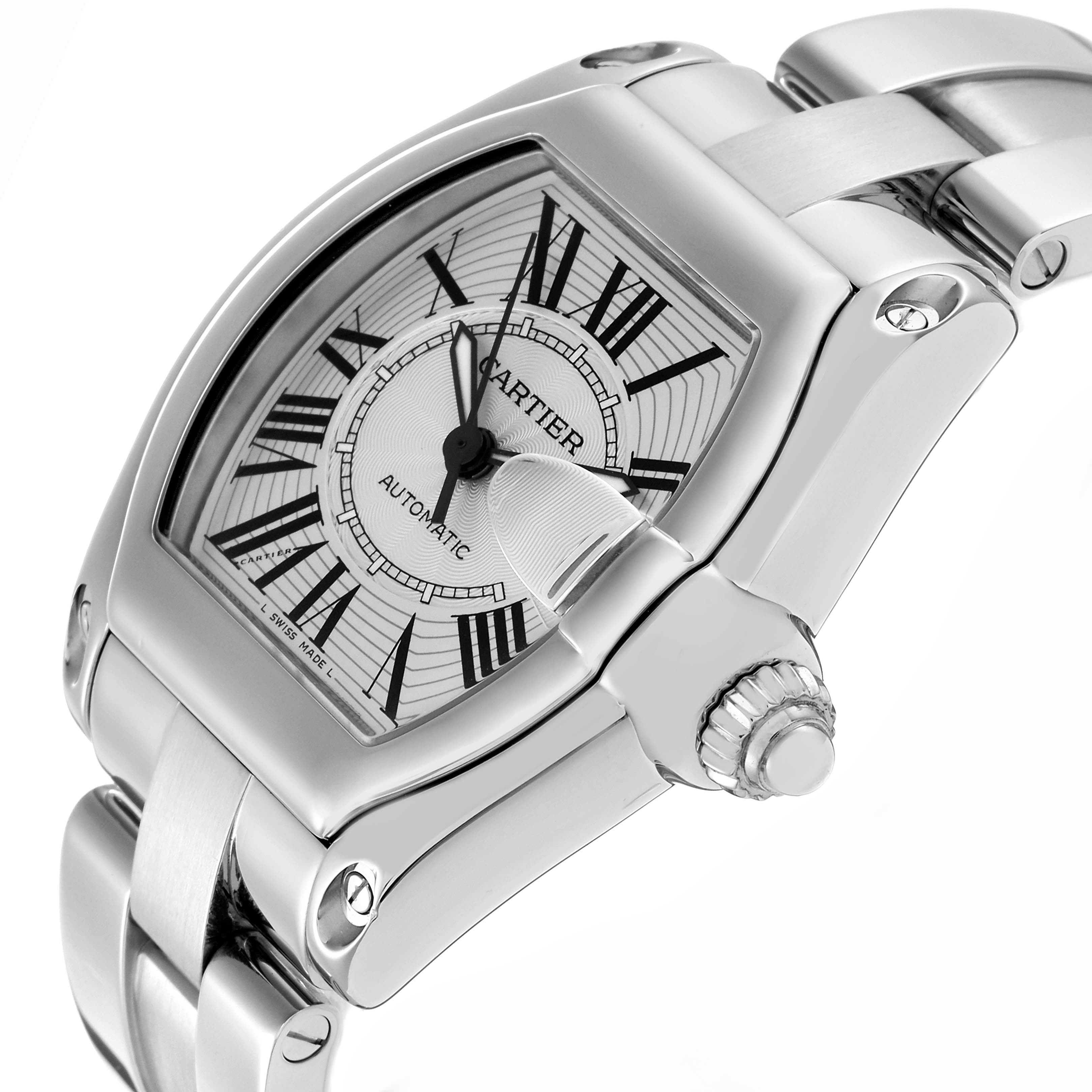 The Cartier Roadster model W62025V3 is shown at a three-quarter angle, highlighting its dial, stainless steel case, bracelet, and prominent crown.