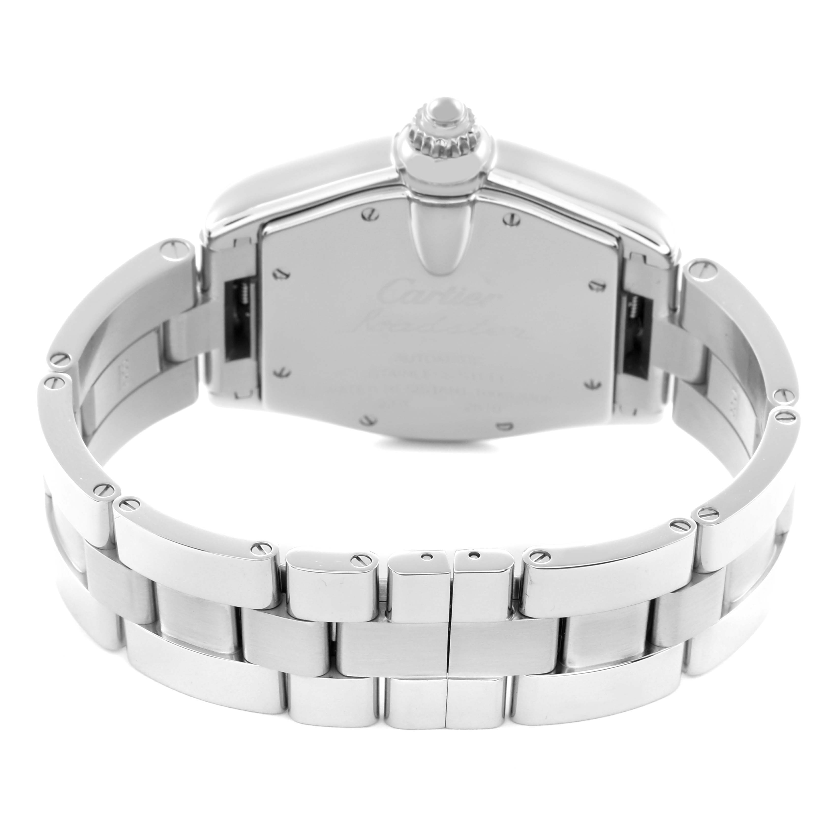The image shows the back of a Cartier Roadster, model number W62025V3, highlighting its stainless steel bracelet and case back.