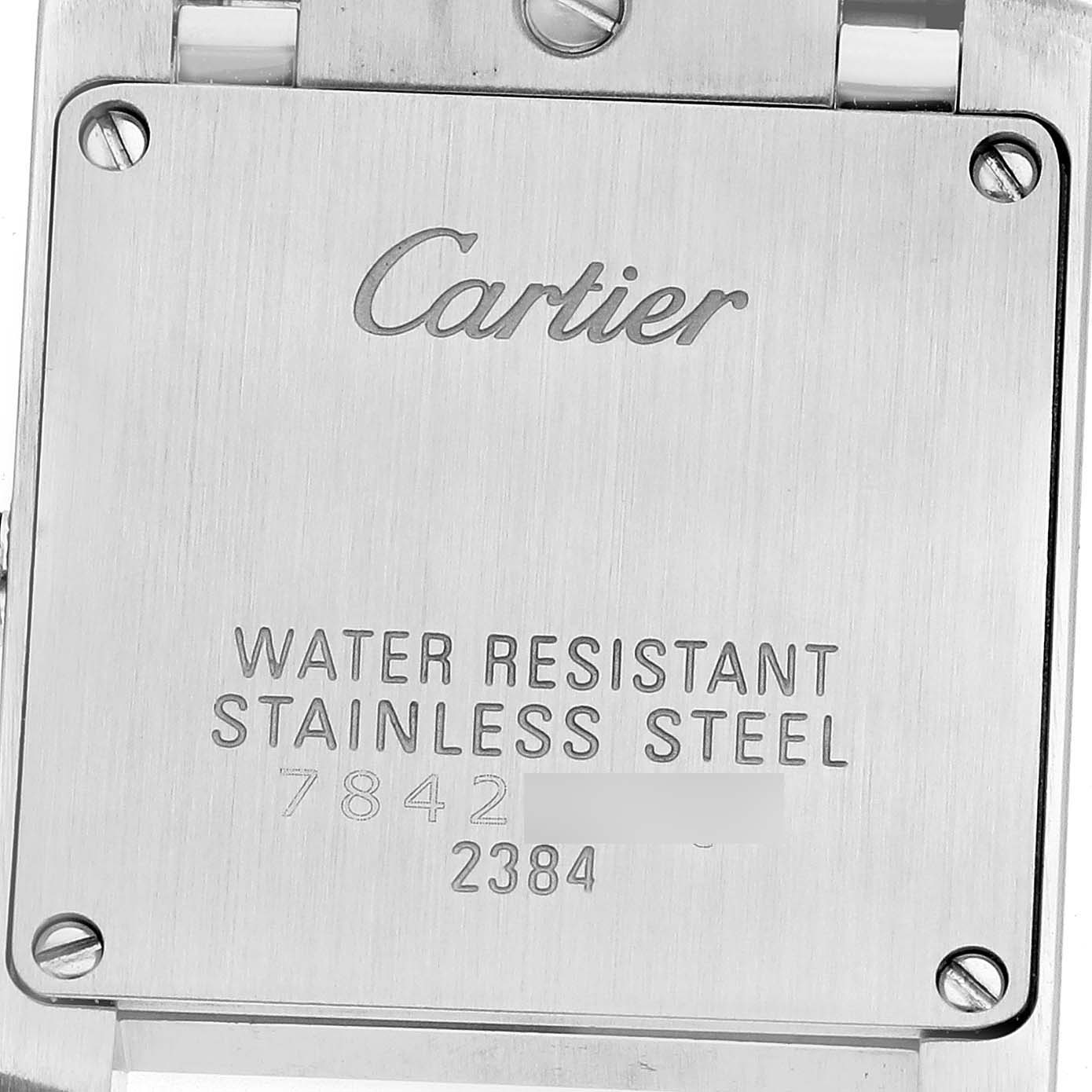 The image shows the back case of a Cartier Tank Francaise Men's watch, model number W51008Q3, displaying the brand name and water resistance details.