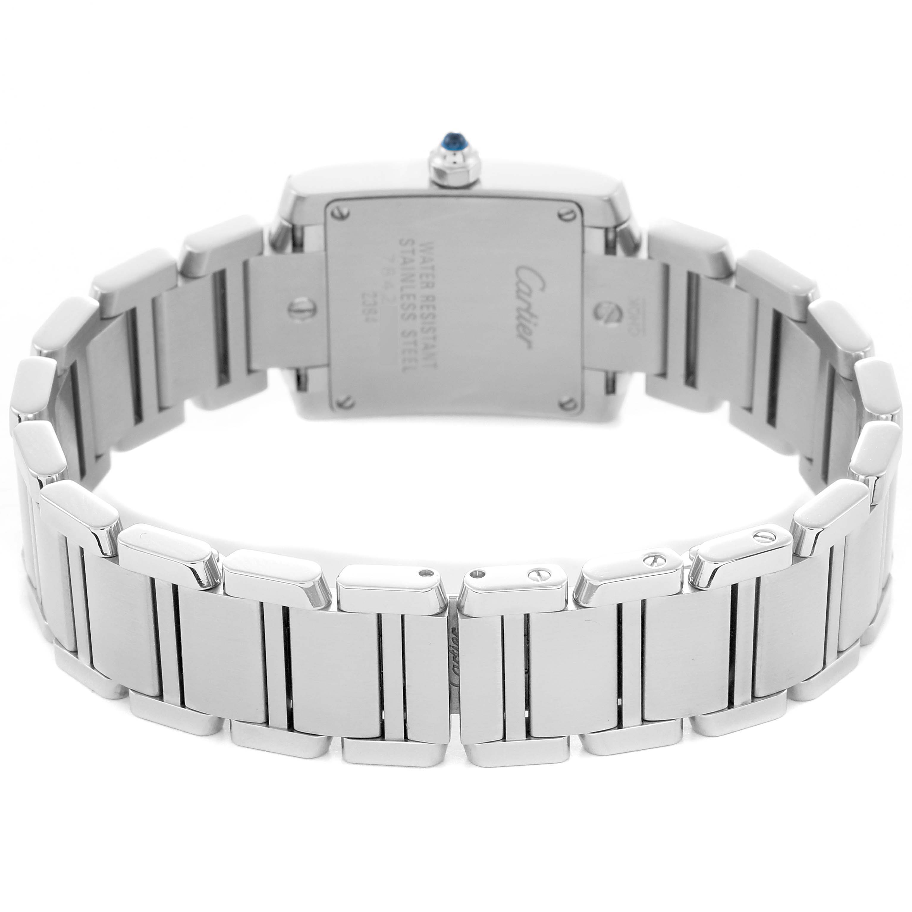 The image shows the back view of a Cartier Tank Française, model W51008Q3, highlighting the stainless steel bracelet and case back.