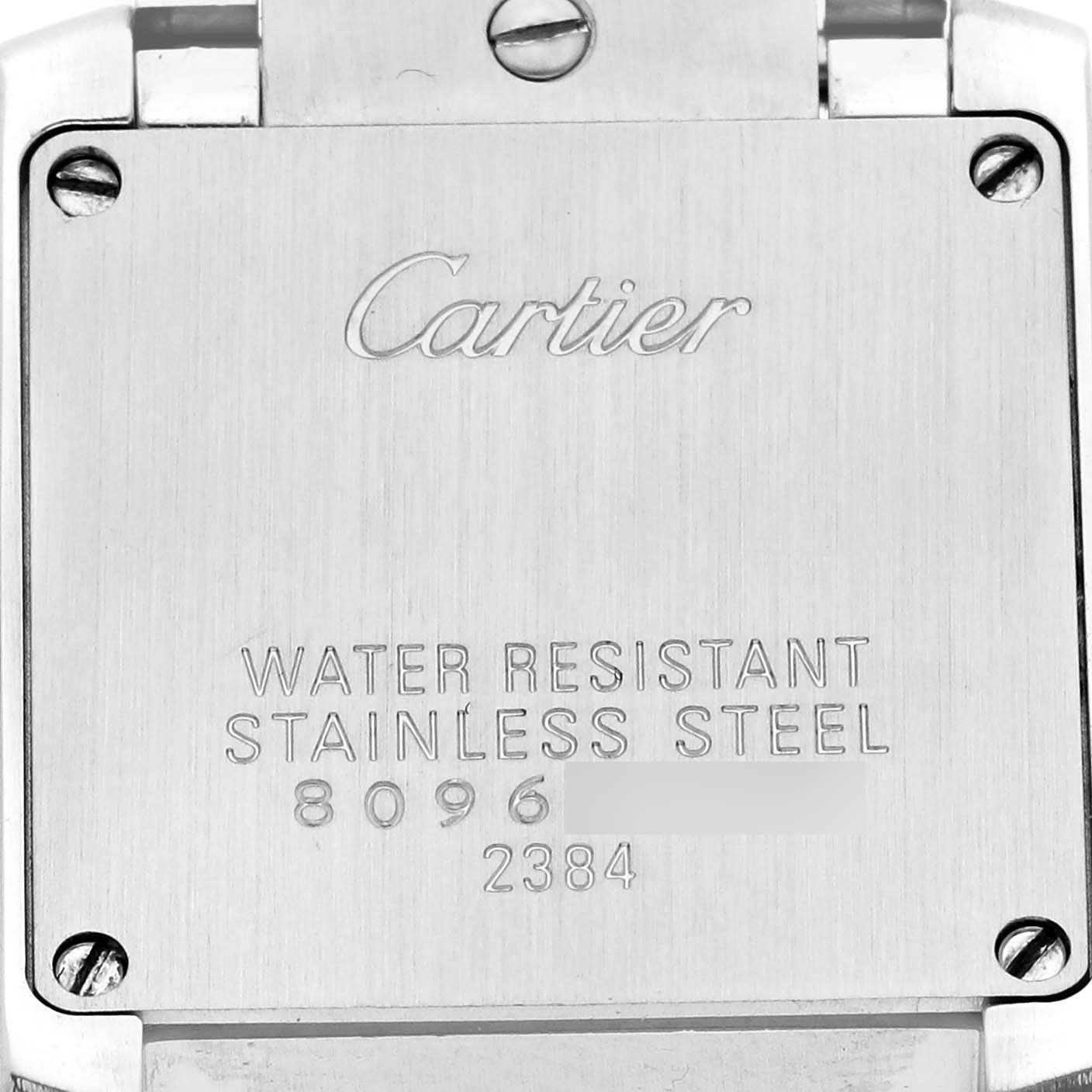 The image shows the back case of the Cartier Tank Francaise model W51007Q4 men's watch, displaying engravings and a stainless steel finish.