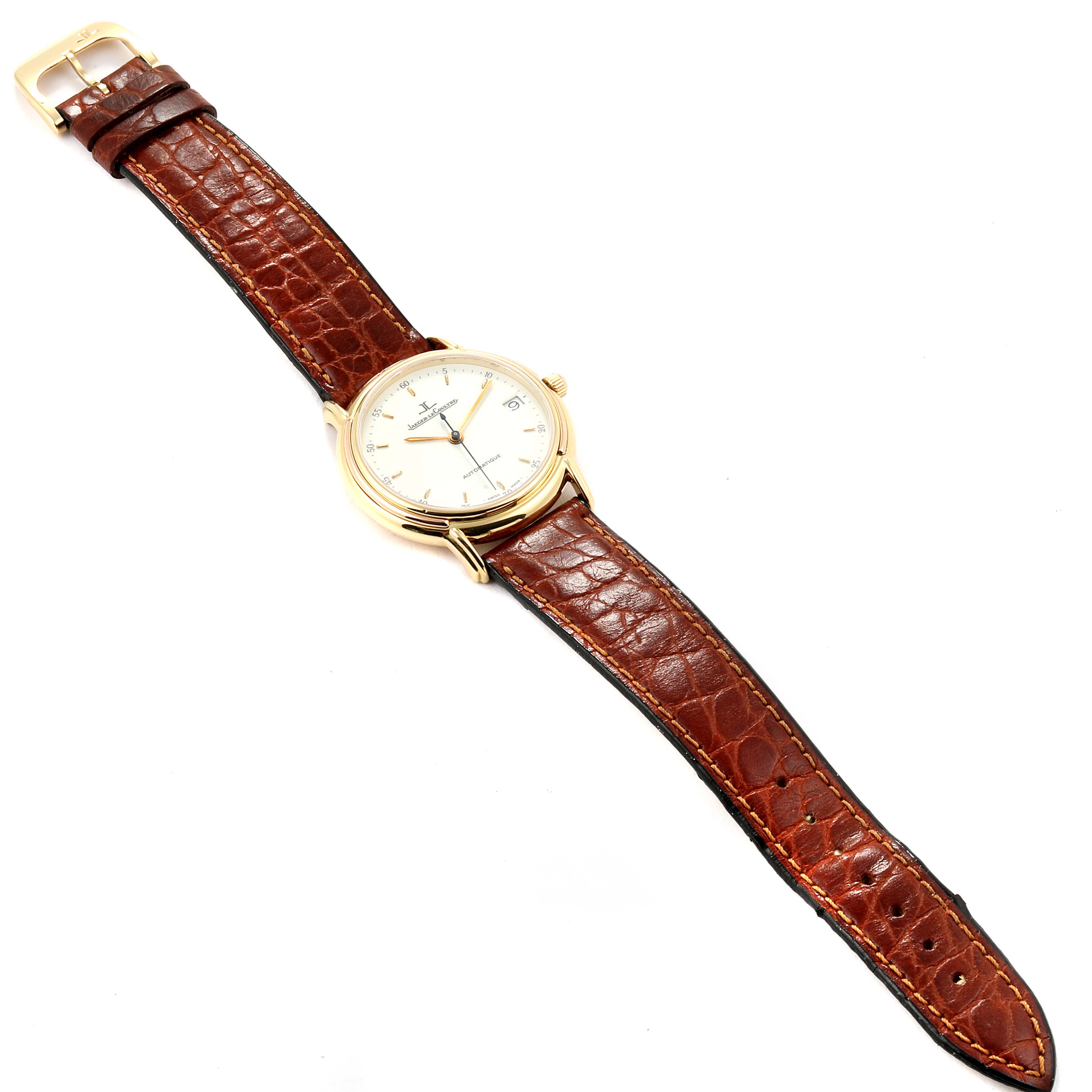 This image shows a Vintage Jaeger LeCoultre watch from a top-down angle, including the dial, case, and brown leather strap.
