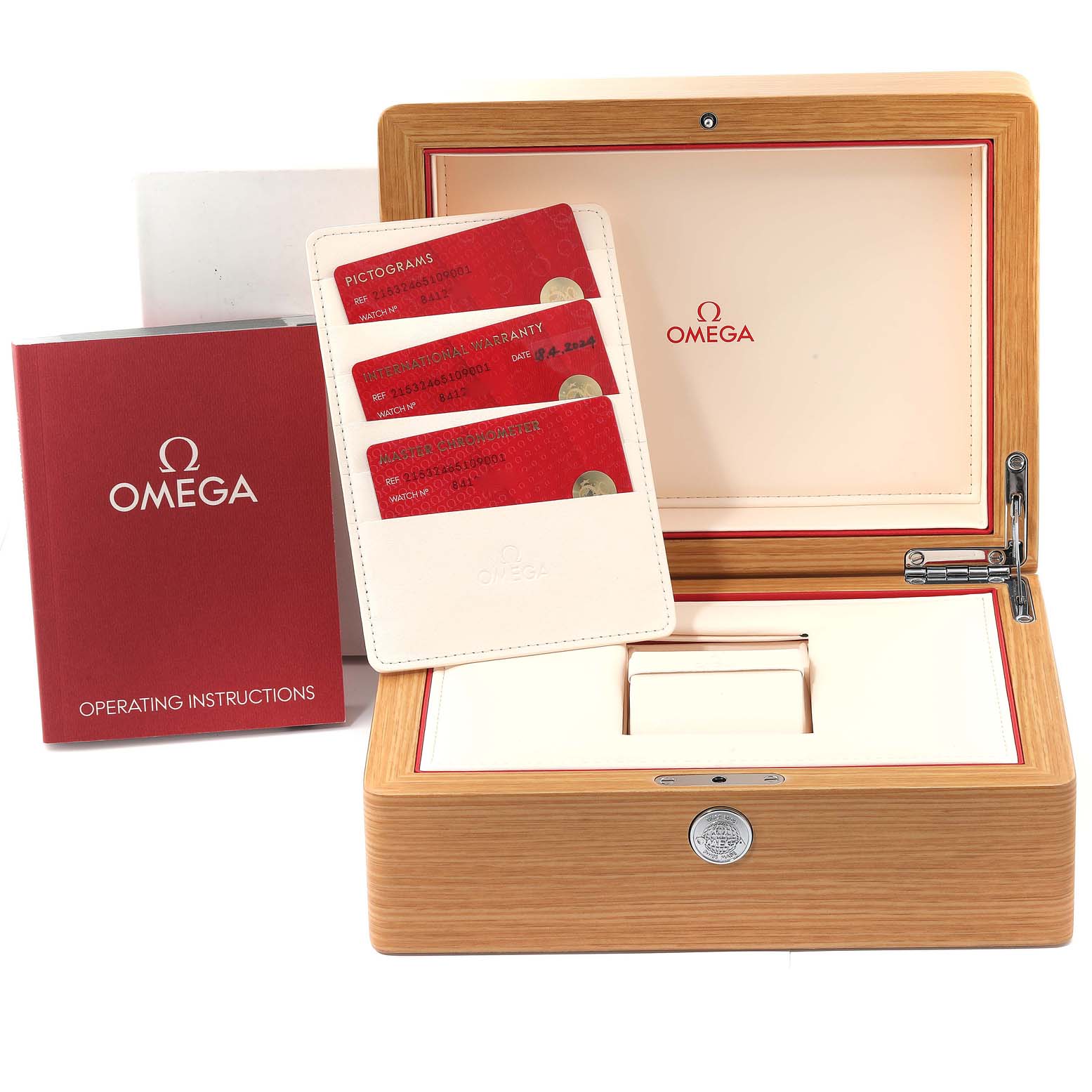 The image shows the Omega Planet Ocean 215.32.46.51.09.001 Men's Stainless Steel Beige Dial 215.32.46.51.09.001 Men's Stainless Steel Beige Dial watch's open box with operating instructions and warranty cards.