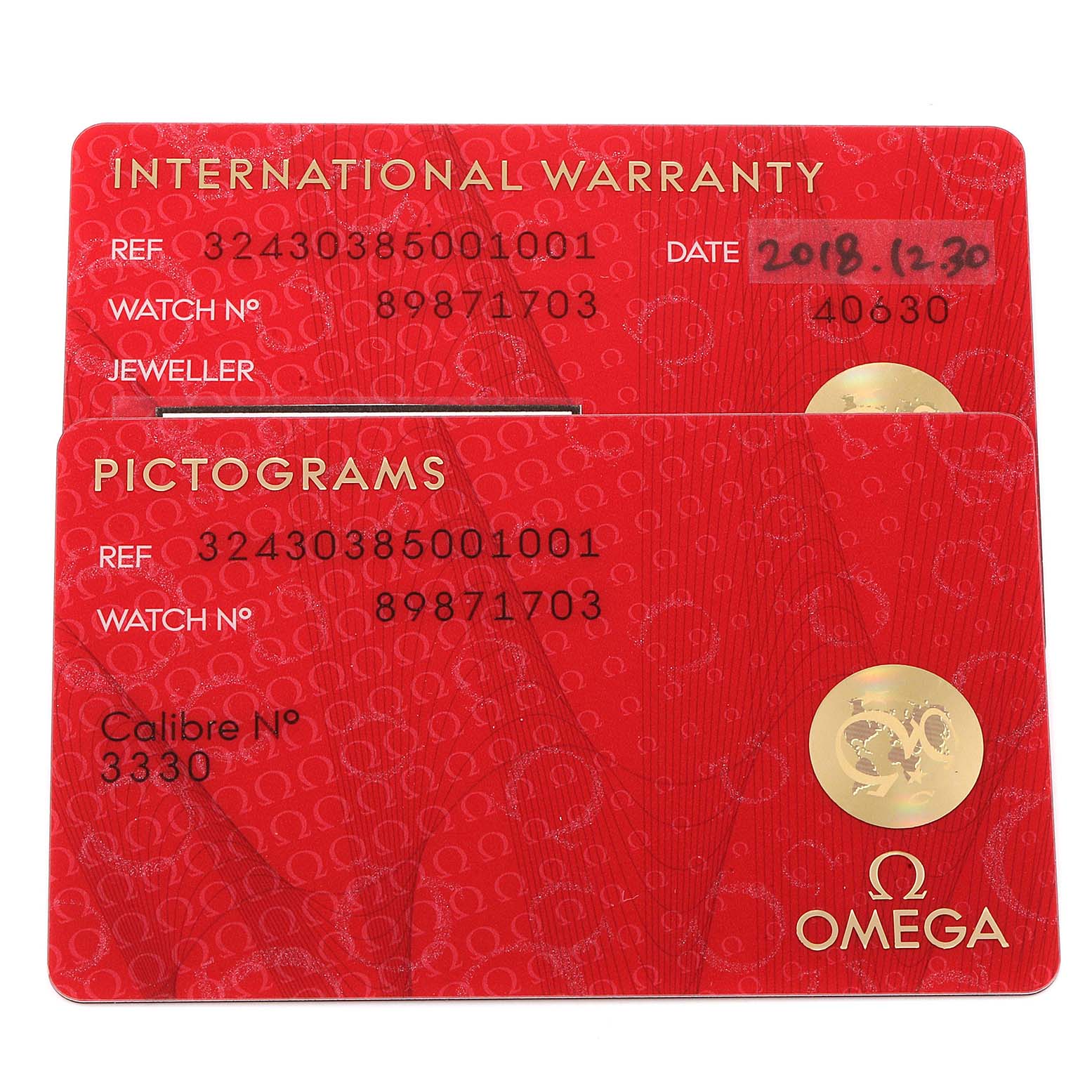 The image shows the International Warranty and Pictograms cards for the Omega Speedmaster 324.30.38.50.01.001 Men
s Stainless Steel Black Dial 324.30.38.50.01.001 Men
s Stainless Steel Black Dial watch, including reference and watch numbers.