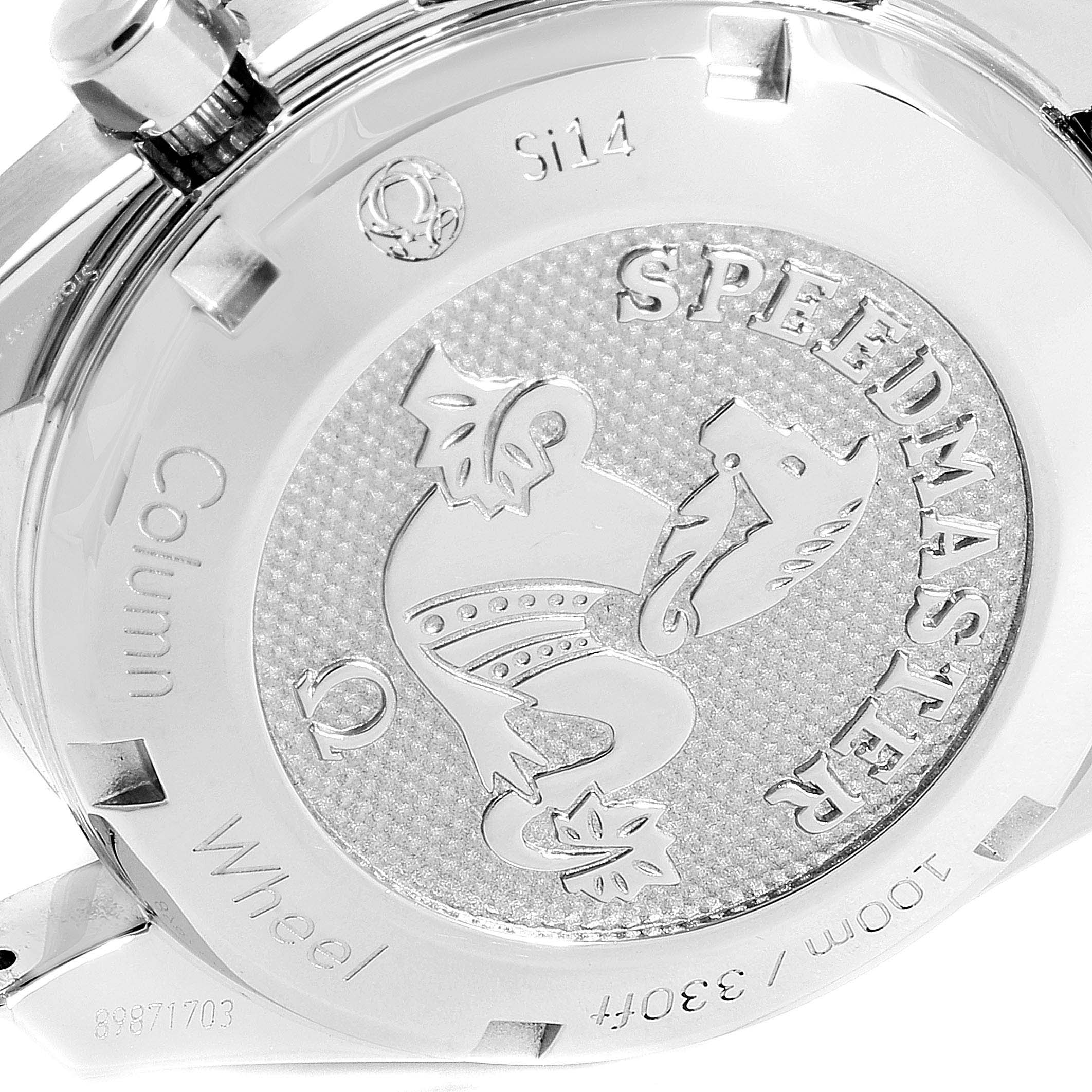 The image shows the case back of an Omega Speedmaster 324.30.38.50.01.001 Men
s Stainless Steel Black Dial 324.30.38.50.01.001 Men
s Stainless Steel Black Dial watch featuring an engraved design and model information.