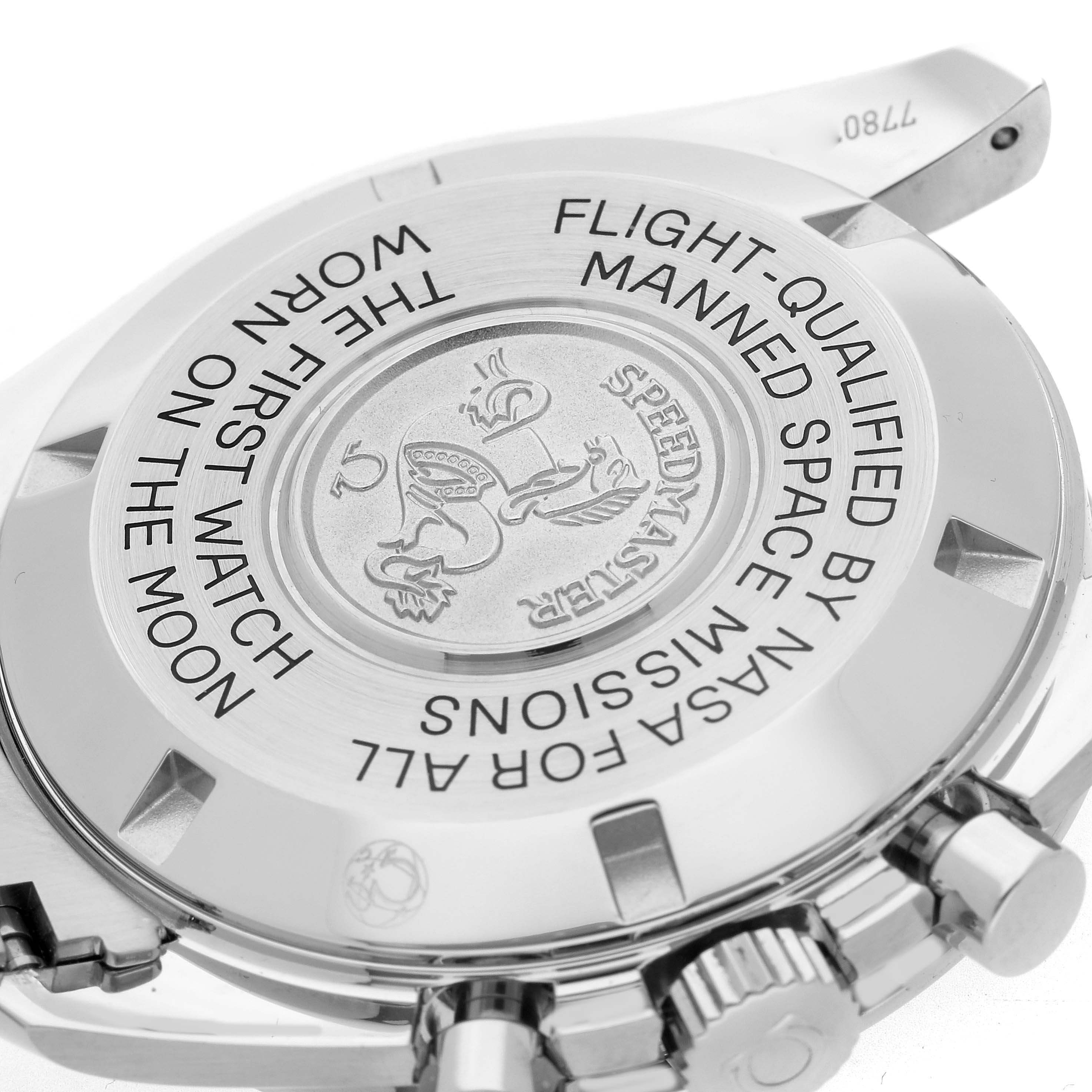 The image shows the case back of an Omega Speedmaster model 311.30.42.30.01.005, featuring engraved text and the iconic logo, viewed from the back angle.