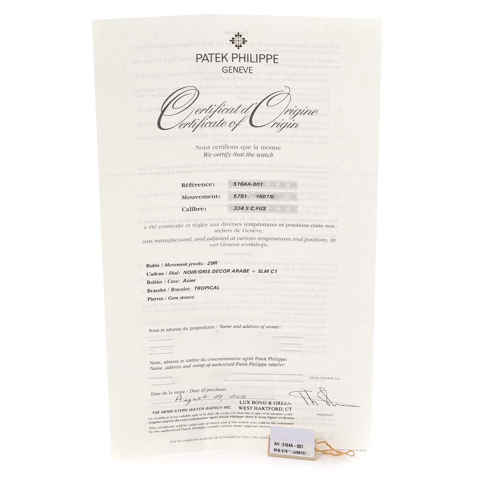 The image shows the Certificate of Origin for a Patek Philippe Aquanaut 5164A-001, featuring details like reference number and purchase information.