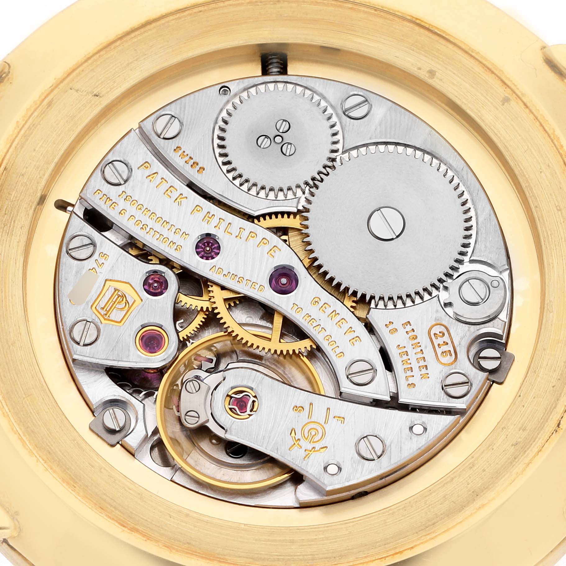 The image shows the intricate backside movement of the Patek Philippe Calatrava model 5119J-001, highlighting gears, rotors, and screws.