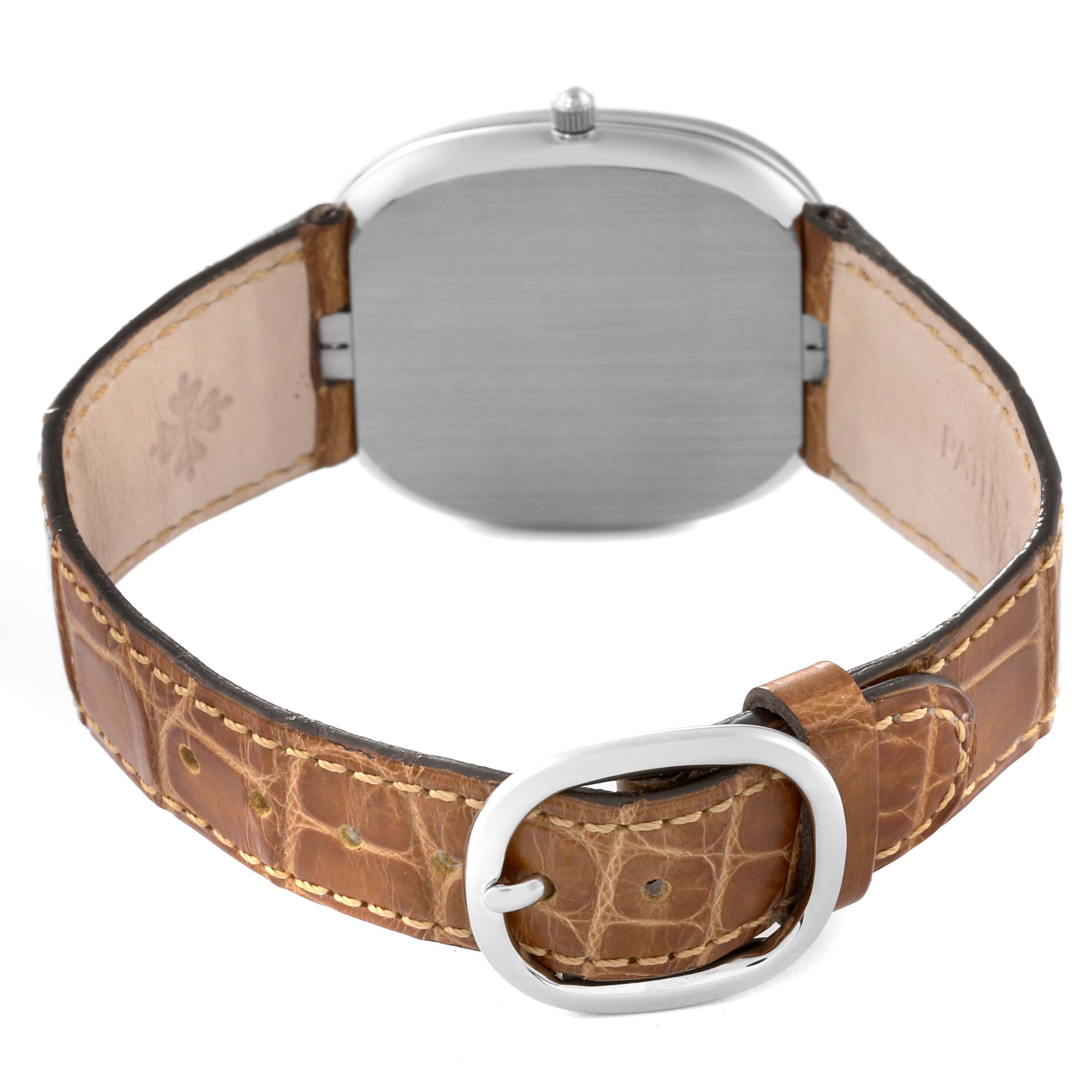 This image shows the back of the Patek Philippe Golden Ellipse 3738/100G-012 Men's White Gold Grey Dial 3738/100G-012 Men's White Gold Grey Dial watch with its leather strap and buckle.