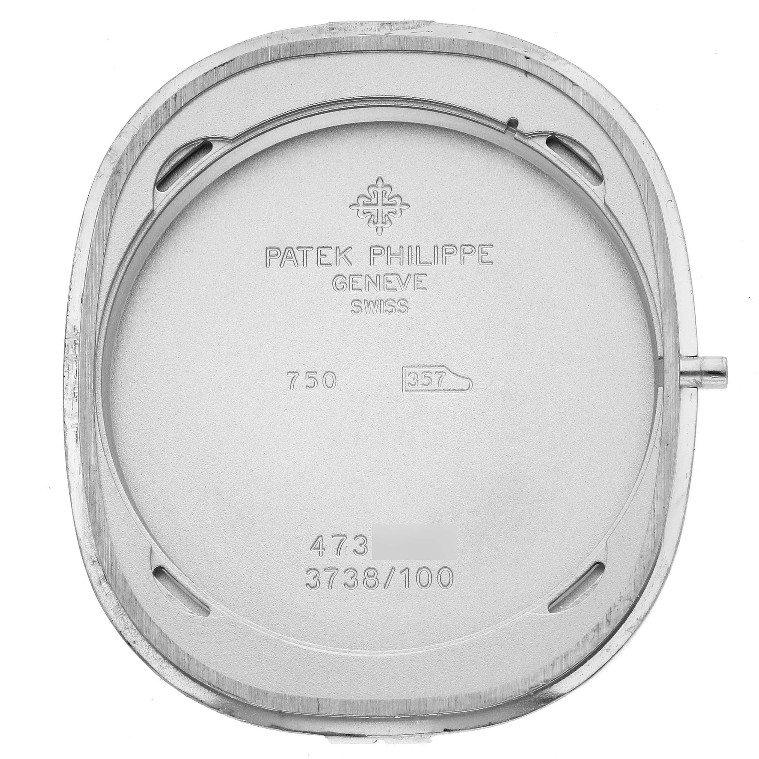 This image shows the inner back cover of a Patek Philippe Golden Ellipse 3738/100G-012 Men's White Gold Grey Dial 3738/100G-012 Men's White Gold Grey Dial watch, displaying its engravings and markings.