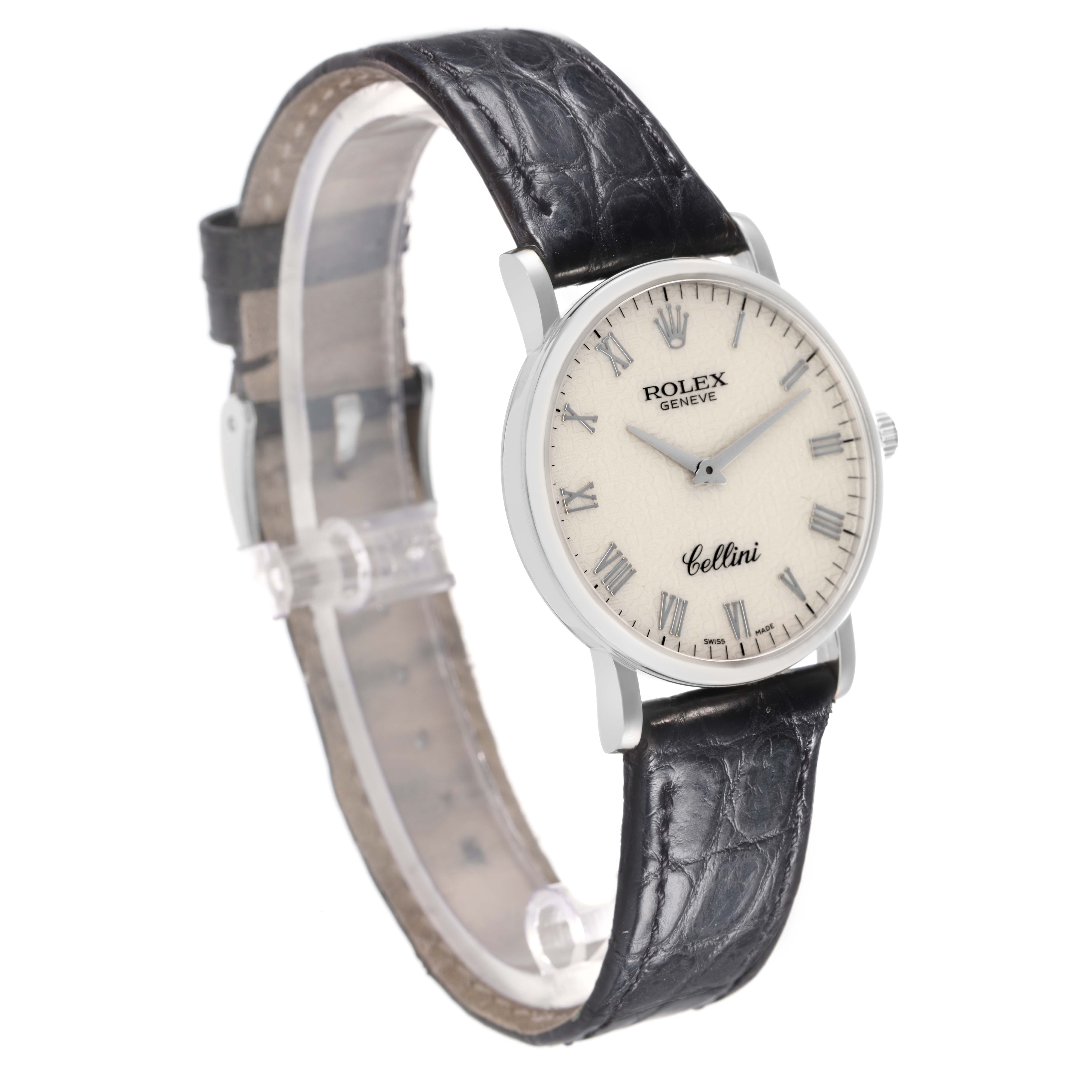 The Rolex Cellini model 5115/9 is shown at a slight angled side view, highlighting its round dial, Roman numerals, and black leather strap.