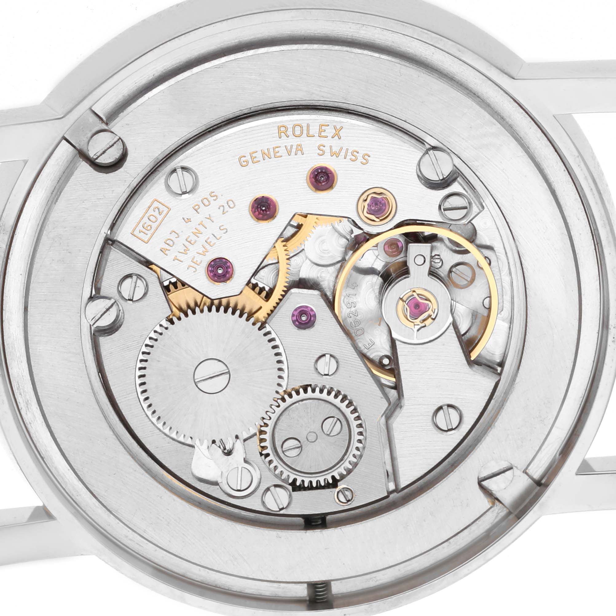 The image shows the back of the Rolex Cellini model 5115/9, highlighting the intricate mechanical movement and gears of the watch.
