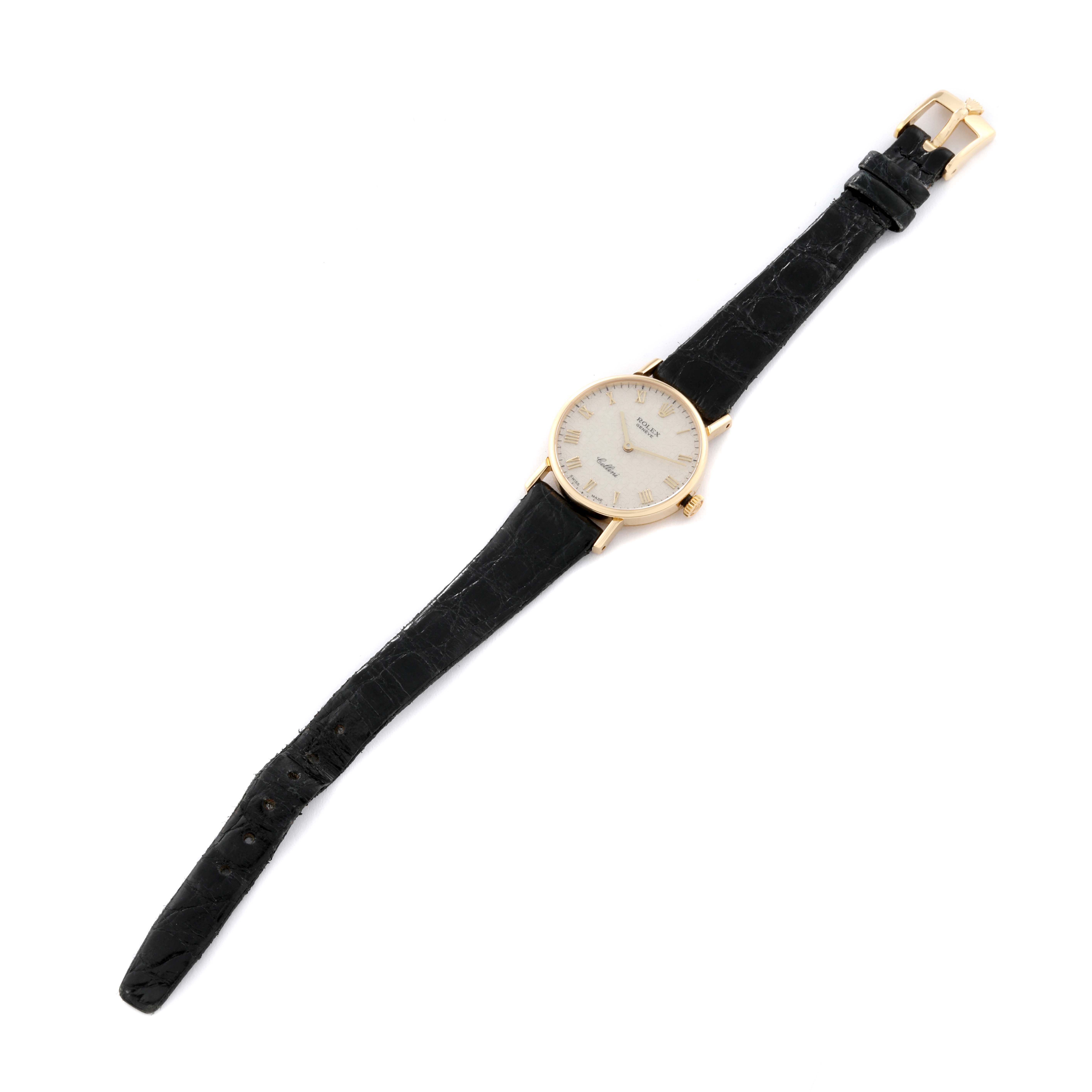 The Rolex Cellini 5109 Women's Yellow Gold White Dial 5109 Women's Yellow Gold White Dial watch is shown at a slight angle, featuring the entire face, black leather strap, and gold buckle.