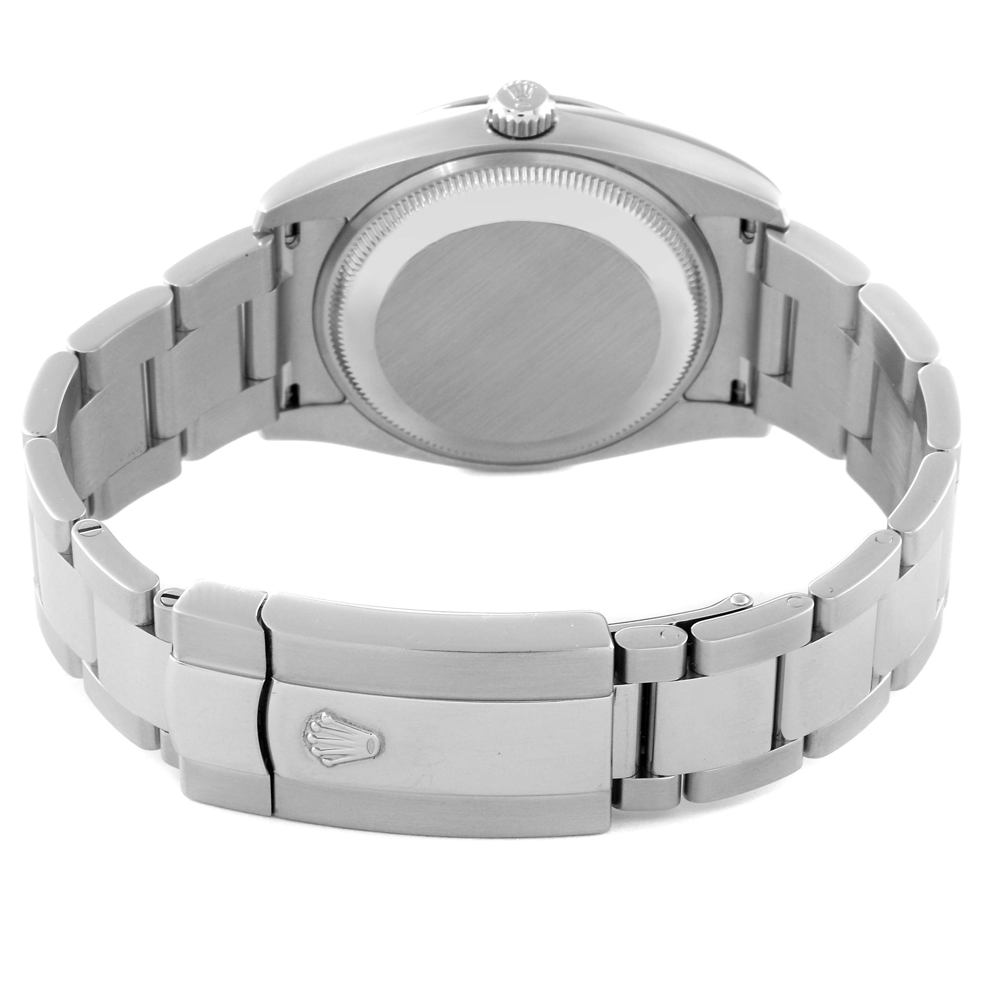 The image shows the back and bracelet of a Rolex Date 115200 Men
s Stainless Steel Black Dial 115200 Men
s Stainless Steel Black Dial model watch at an angled rear view.