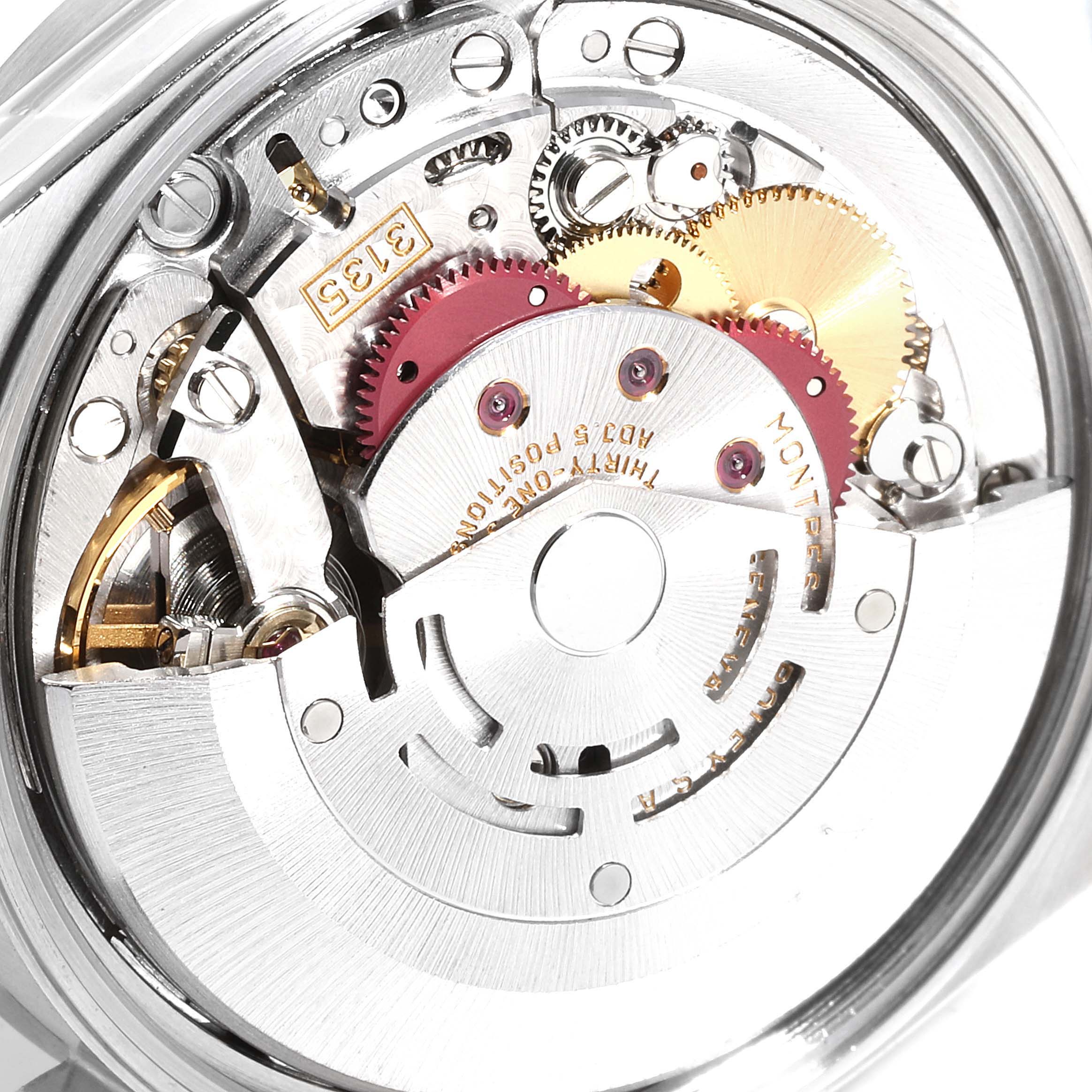 This image shows the inner mechanism and movement of a Rolex Date 15210 Men's Stainless Steel Black Dial 15210 Men's Stainless Steel Black Dial model watch, viewed from the back.