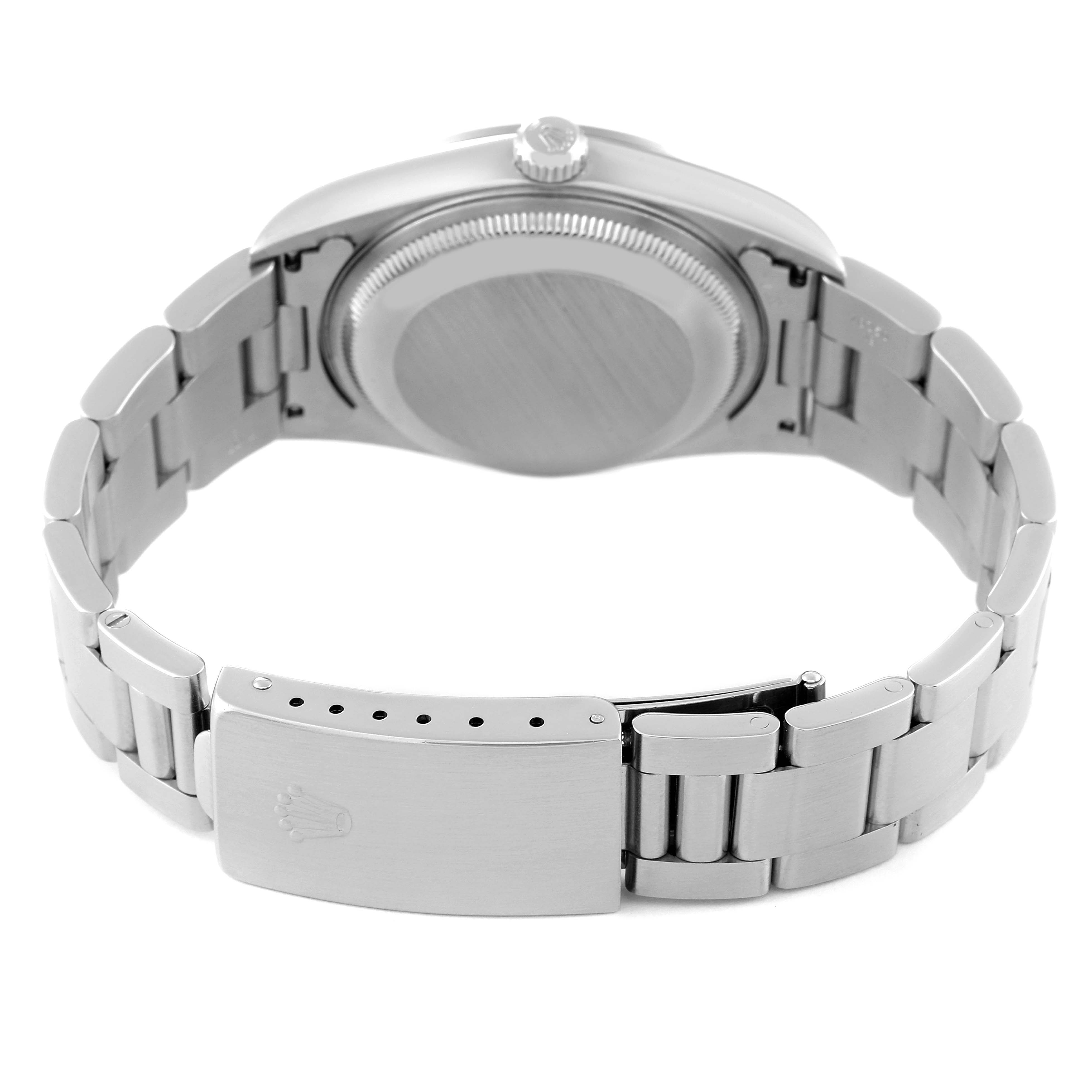 This image shows the back case, crown, and clasp of the Rolex Date 15200 Men's Stainless Steel Blue Dial 15200 Men's Stainless Steel Blue Dial model watch.