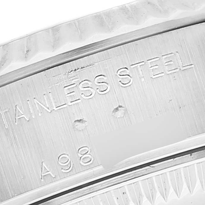 Close-up of the stainless steel engraving on the case back of a Rolex Datejust 79174 Women's Stainless Steel Black Dial 79174 Women's Stainless Steel Black Dial watch.
