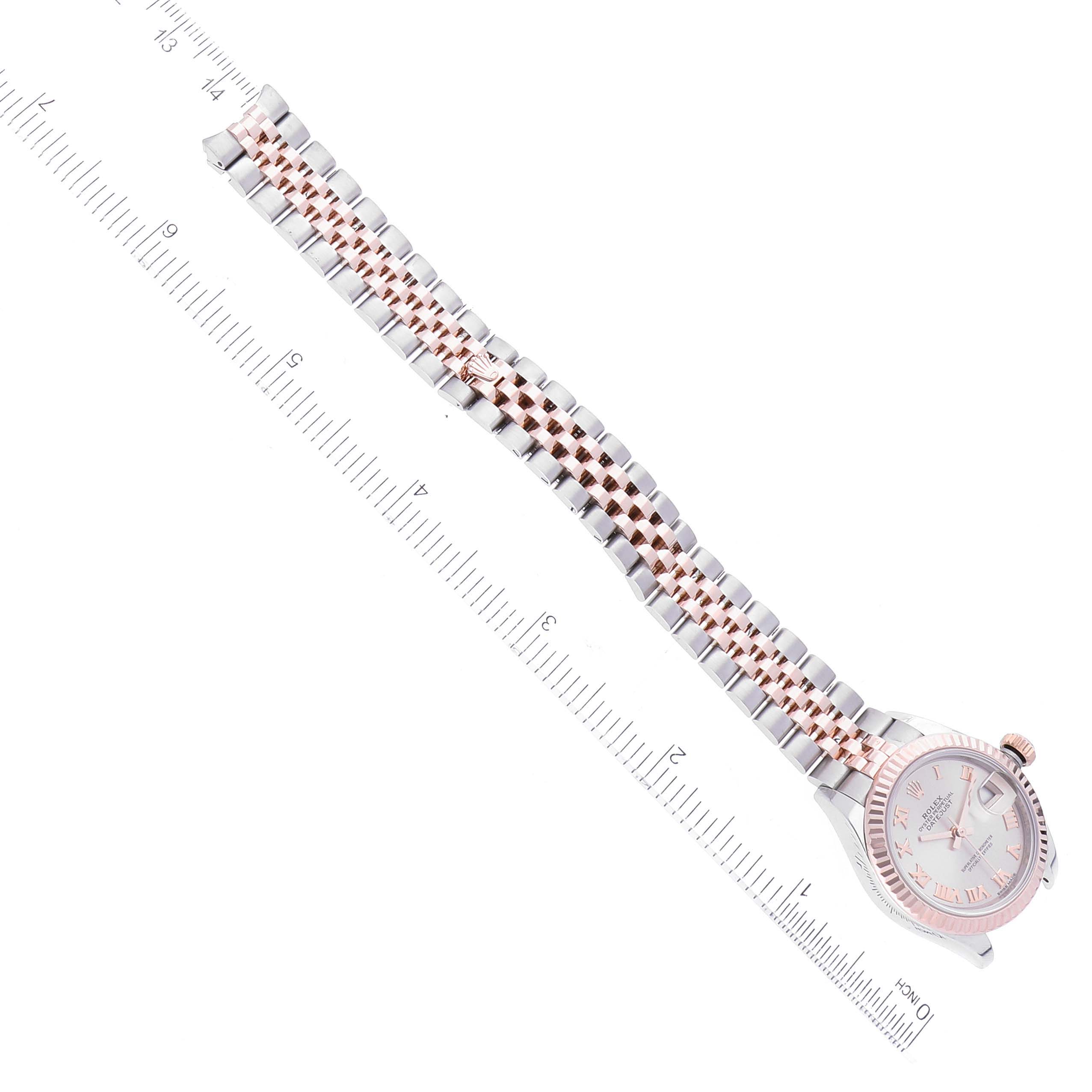 The image shows a Rolex Datejust 279171 Women's Steel and Gold (two tone) Silver Dial 279171 Women's Steel and Gold (two tone) Silver Dial watch positioned vertically alongside a ruler, displaying the face, bezel, and jubilee bracelet.