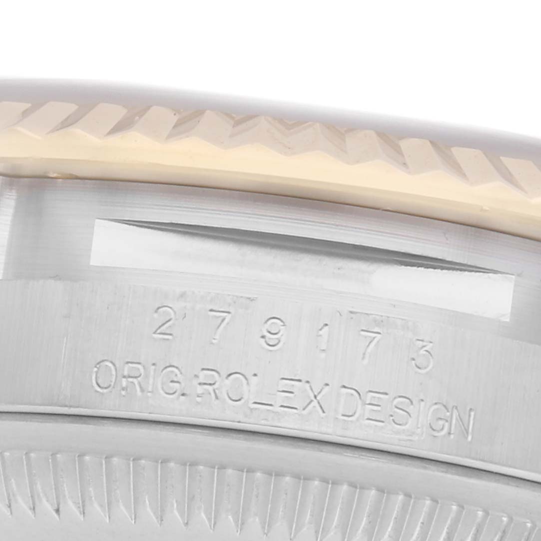 The image shows a close-up of the case side and fluted bezel of a Rolex Datejust, model number 279173, with the engraving "ORIG ROLEX DESIGN."