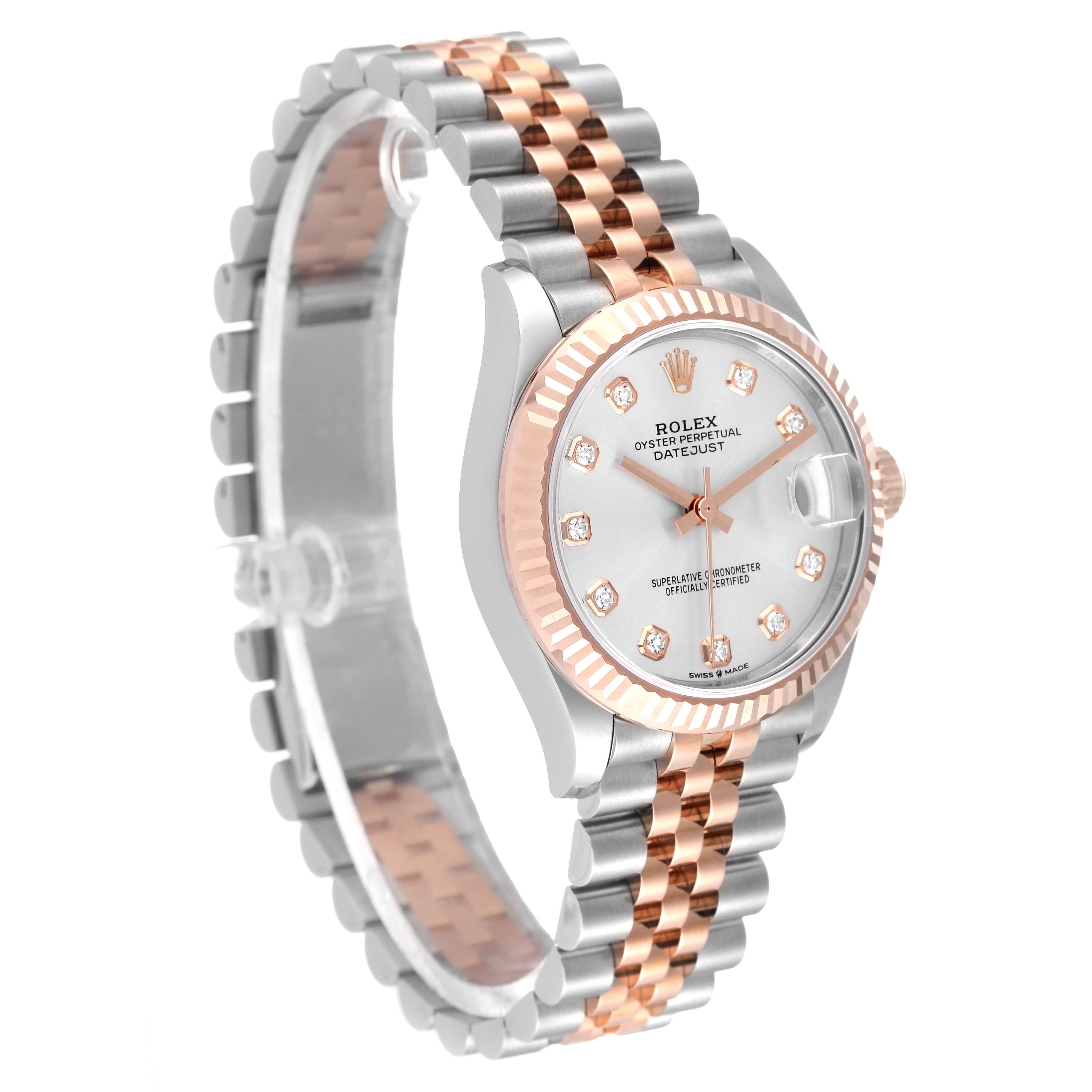 The image shows a side angle of a Rolex Datejust 278271 Women
s Steel and Gold (two tone) Silver Dial 278271 Women
s Steel and Gold (two tone) Silver Dial watch featuring a two-tone metal bracelet and a diamond-set dial.
