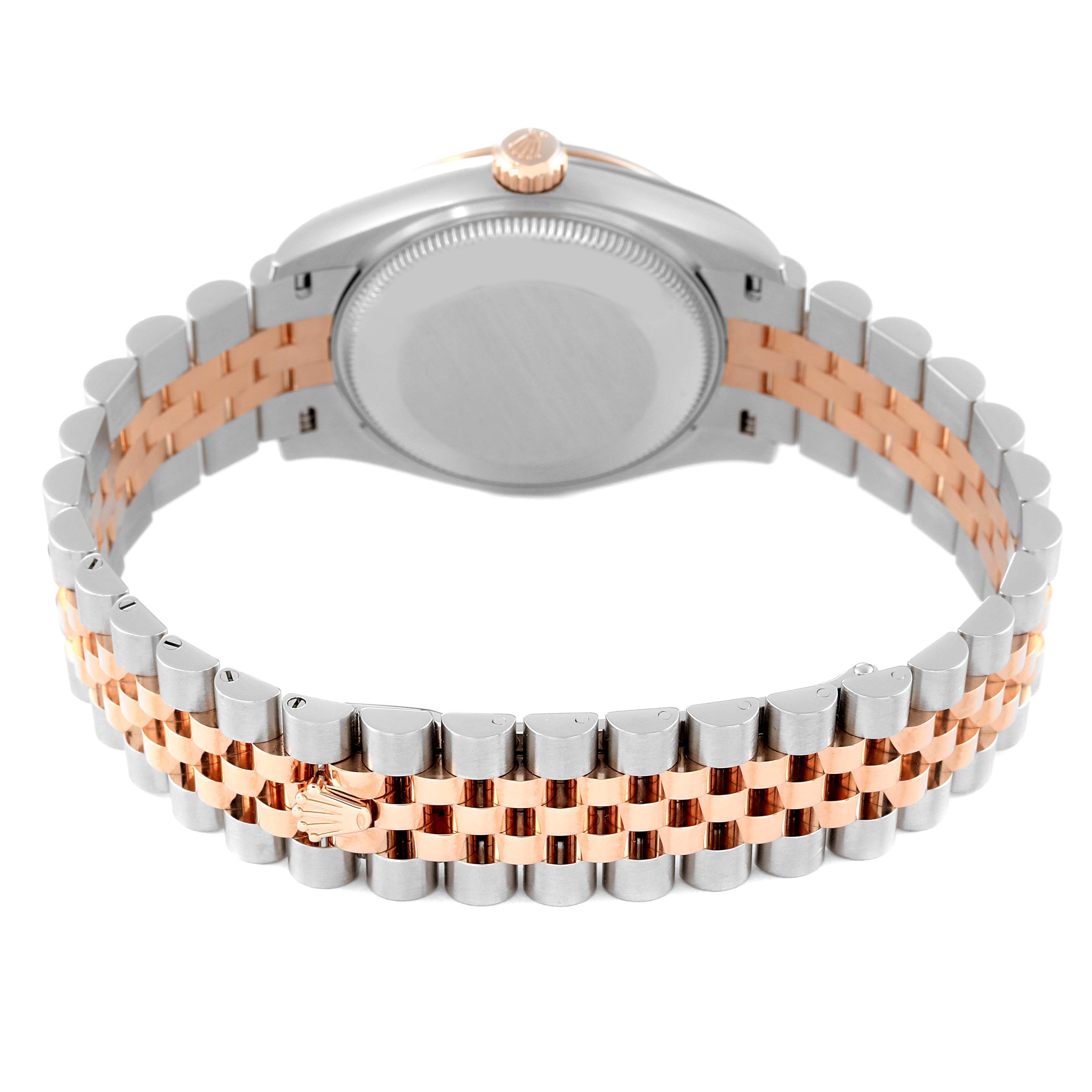 The image shows the back and bracelet of a Rolex Datejust 278271 Women
s Steel and Gold (two tone) Silver Dial 278271 Women
s Steel and Gold (two tone) Silver Dial watch, focusing on the two-tone metal links and the watch case back.