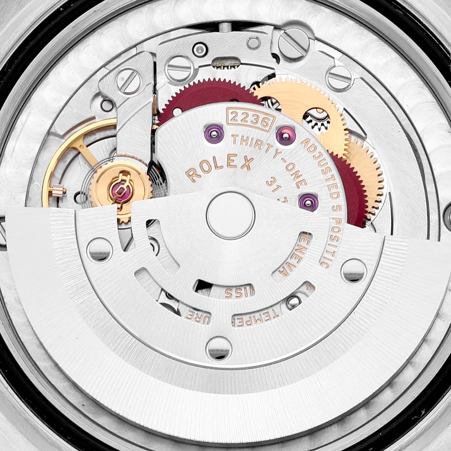 This image shows a detailed view of the movement of a Rolex Mid-Size 278341 Women's Steel and Gold (two tone) White Dial 278341 Women's Steel and Gold (two tone) White Dial model watch.
