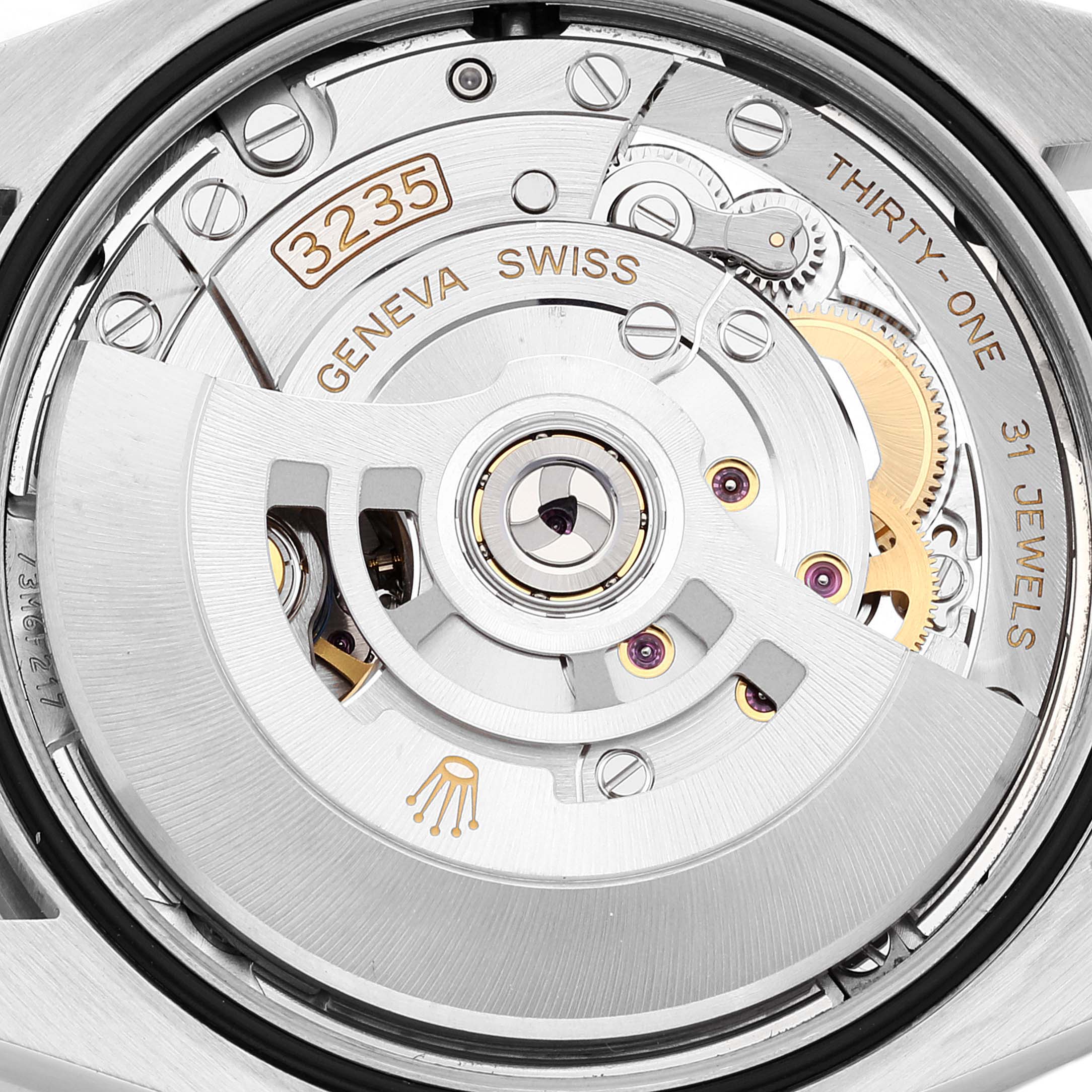 Close-up view of the Rolex Datejust 126200 Men's Stainless Steel Silver Dial 126200 Men's Stainless Steel Silver Dial 3235 movement, showing the intricate components and engravings.