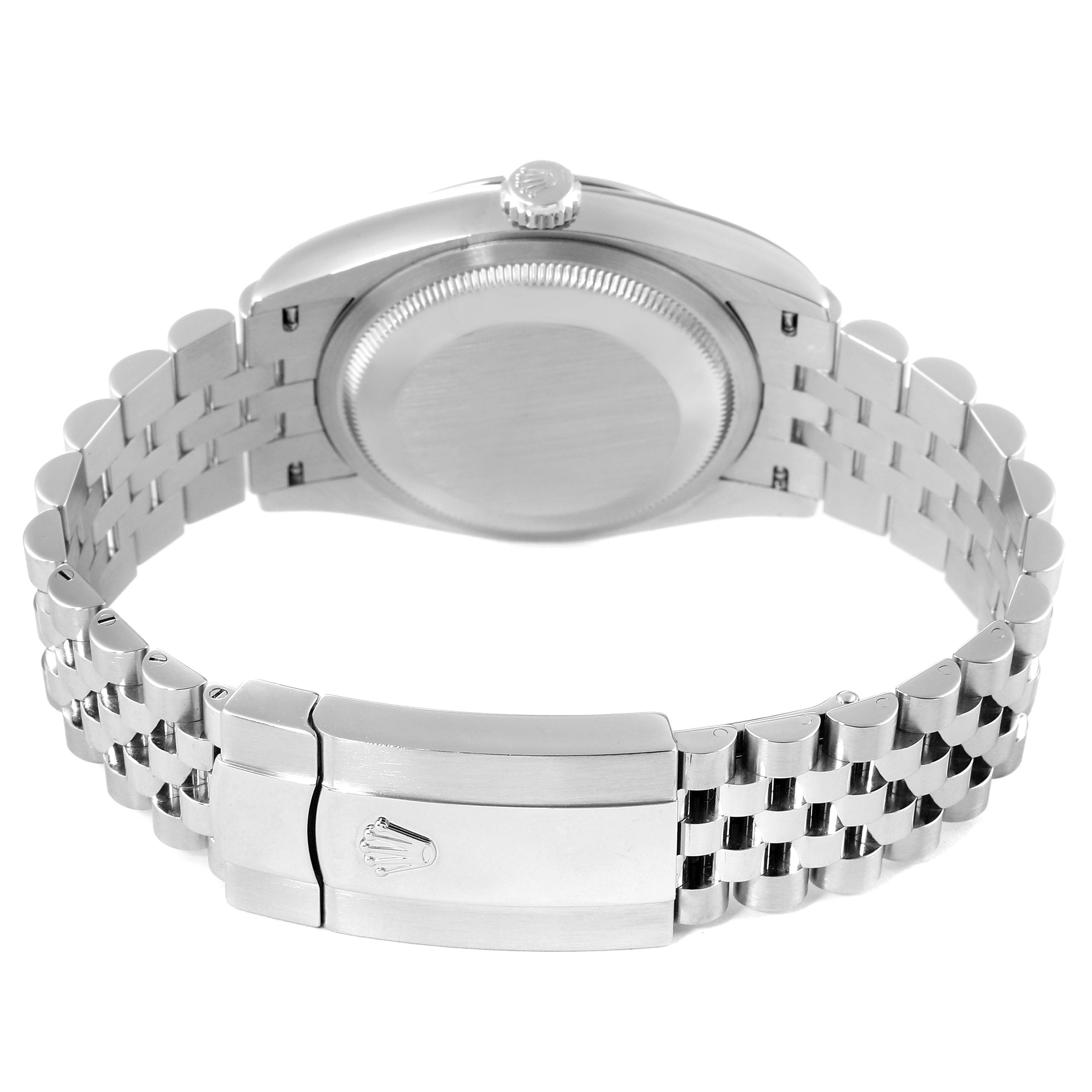 The image shows the backside and bracelet of a Rolex Datejust 126200 Men's Stainless Steel Silver Dial 126200 Men's Stainless Steel Silver Dial watch, highlighting the case back, crown, and clasp.