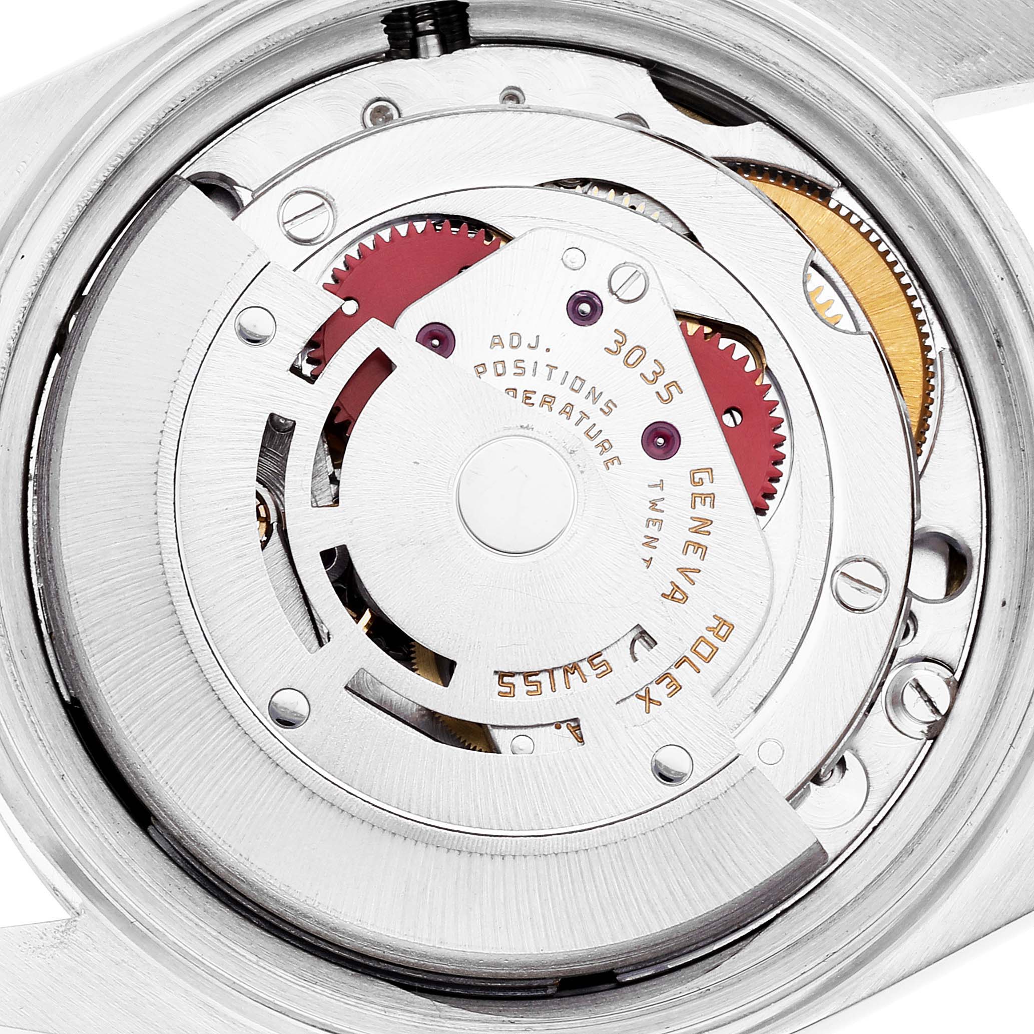 The image shows the internal mechanism of a Rolex Vintage Collection 16013 Men's Steel and Gold (two tone) Black Dial 16013 Men's Steel and Gold (two tone) Black Dial watch, highlighting the rotor and gears.