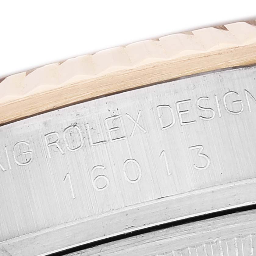 This image shows a close-up angle of the engraved case side of the Vintage Collection Rolex model 16013.